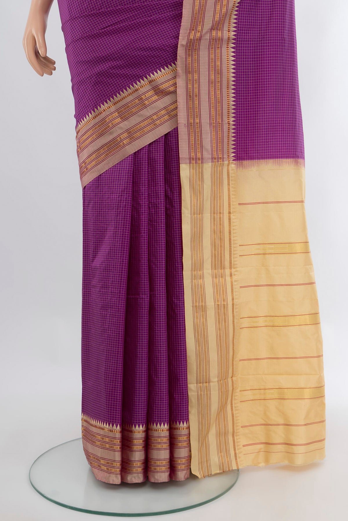 Pleats and pallu of Violet Narayanpet Silk Saree with Checked design on the body and Zari Border. 