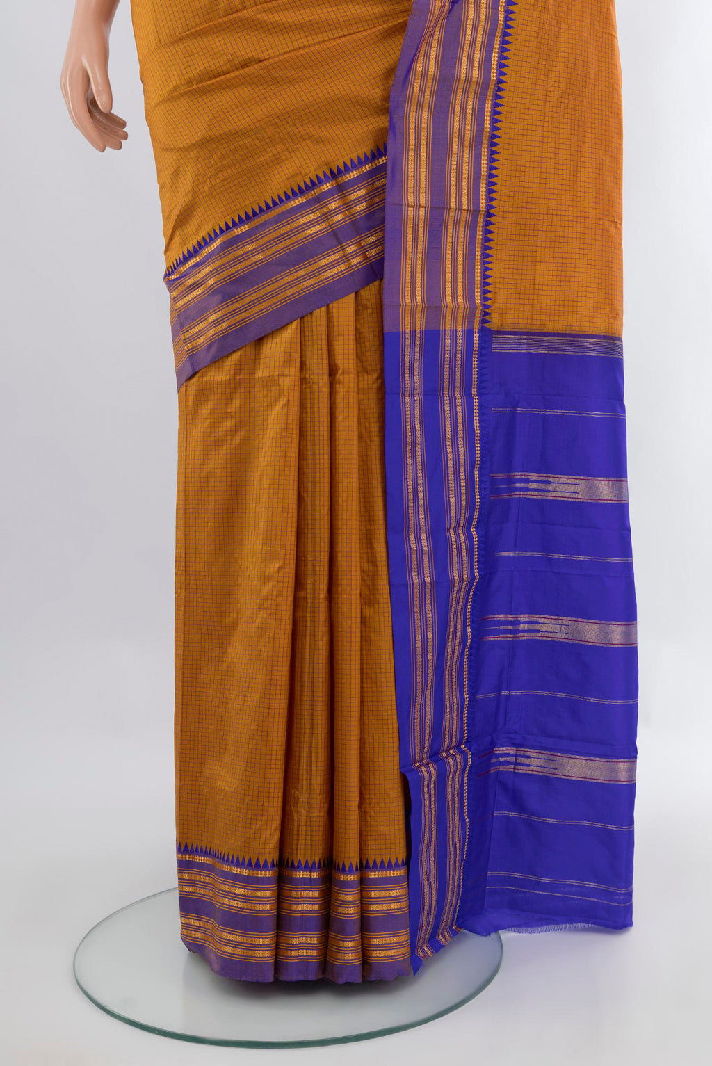 Pleats and pallu of Mustard Narayanpet Silk Saree with Checked design on the body and Zari Border. 
