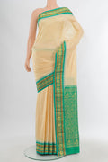 Sandal Bangalore Silk - kadyal Saree with Zari Butta on the body and Zari Border.  displayed on a mannequin