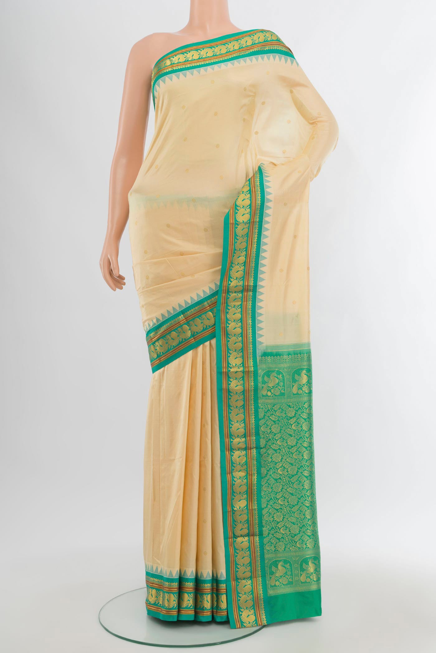Sandal Bangalore Silk - kadyal Saree with Zari Butta on the body and Zari Border.  displayed on a mannequin
