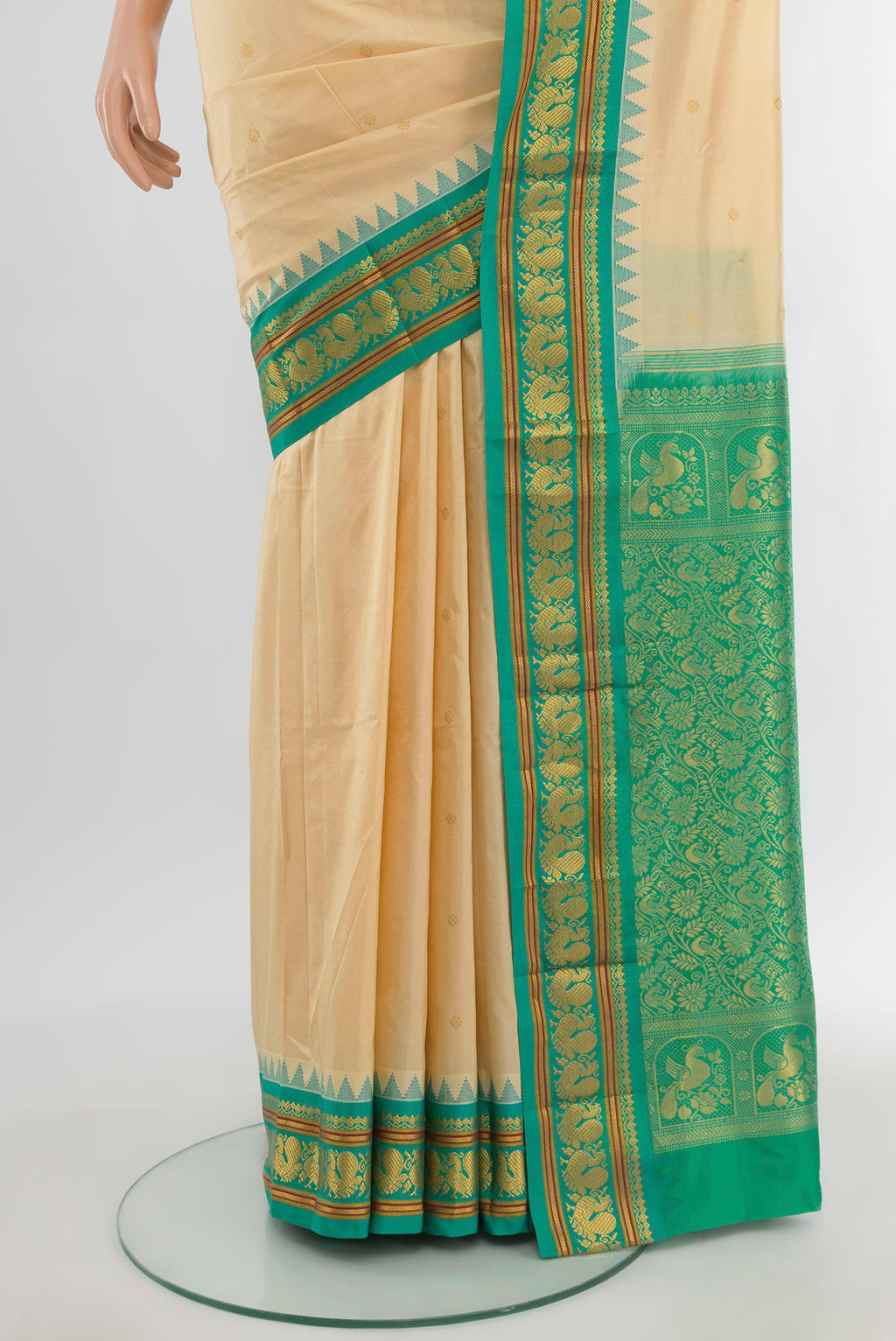 Pleats and pallu of Sandal Bangalore Silk - kadyal Saree with Zari Butta on the body and Zari Border. 