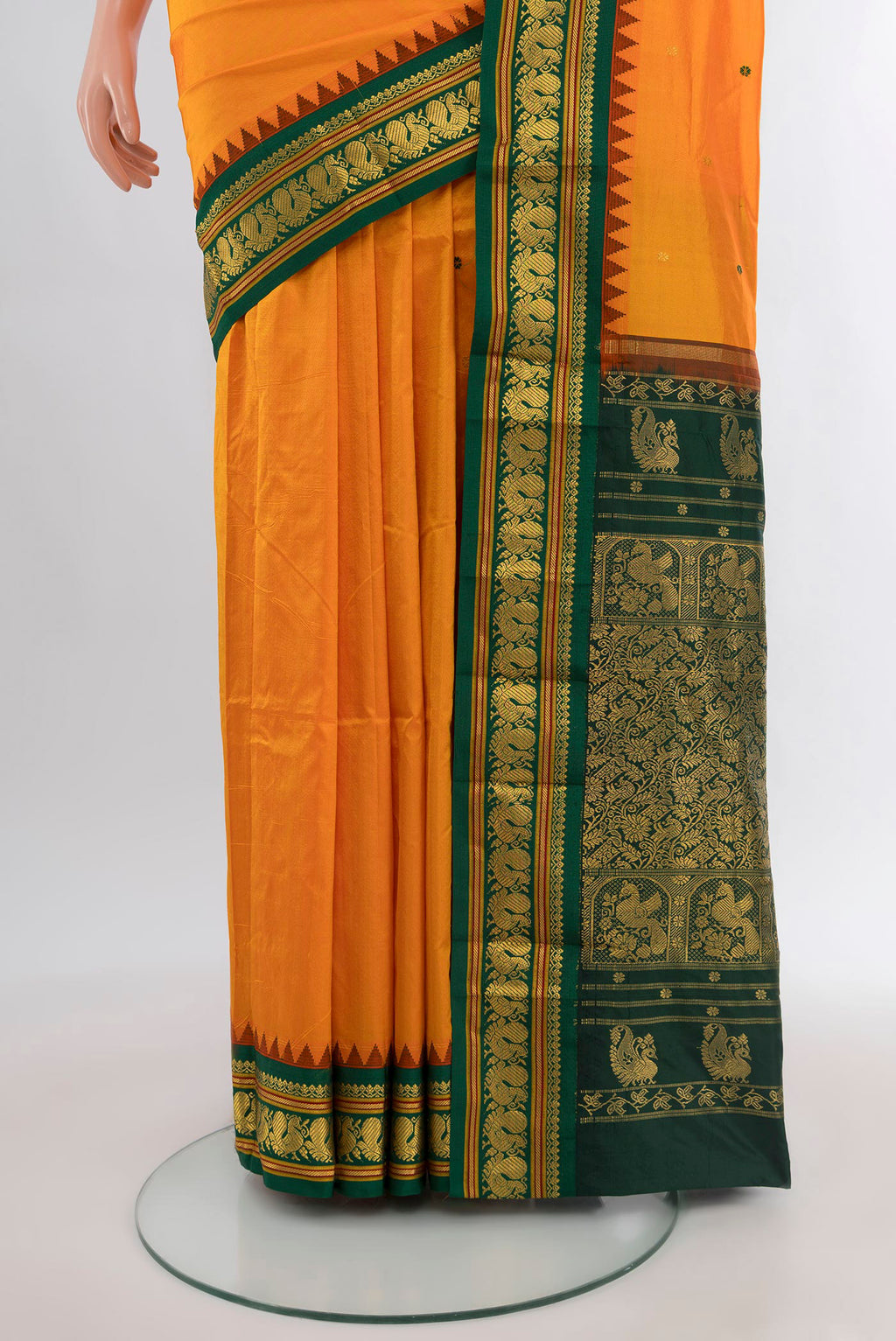 Pleats and pallu of Yellow Bangalore Silk - kadyal Saree with Zari Butta on the body and Zari Border. 