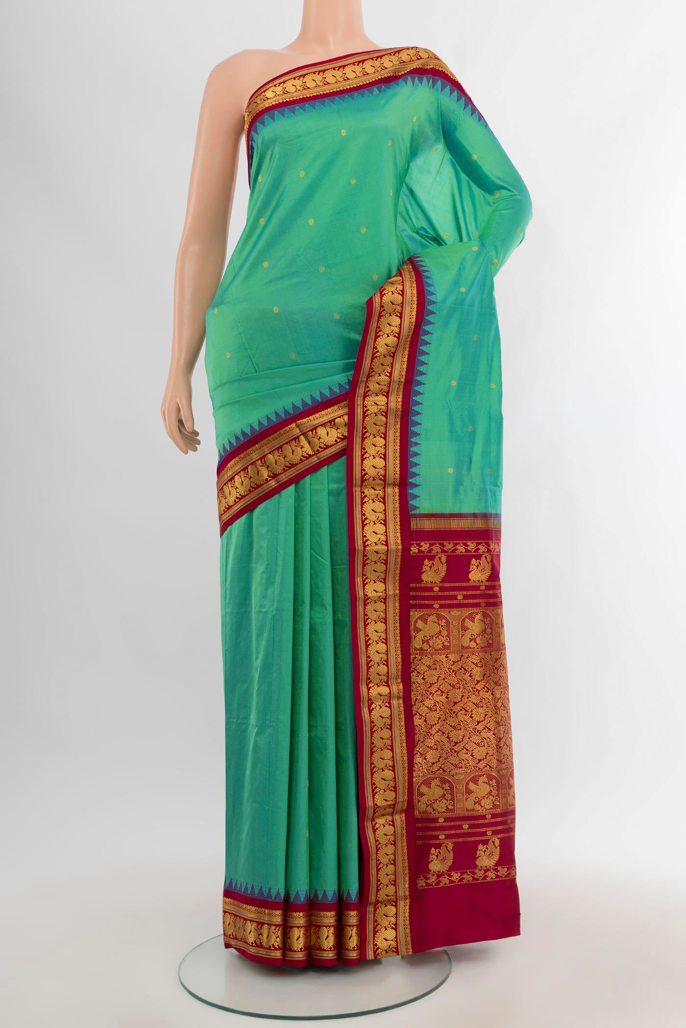 Multi Color Bangalore Silk - kadyal Saree with Zari Butta on the body and Zari Border.  displayed on a mannequin