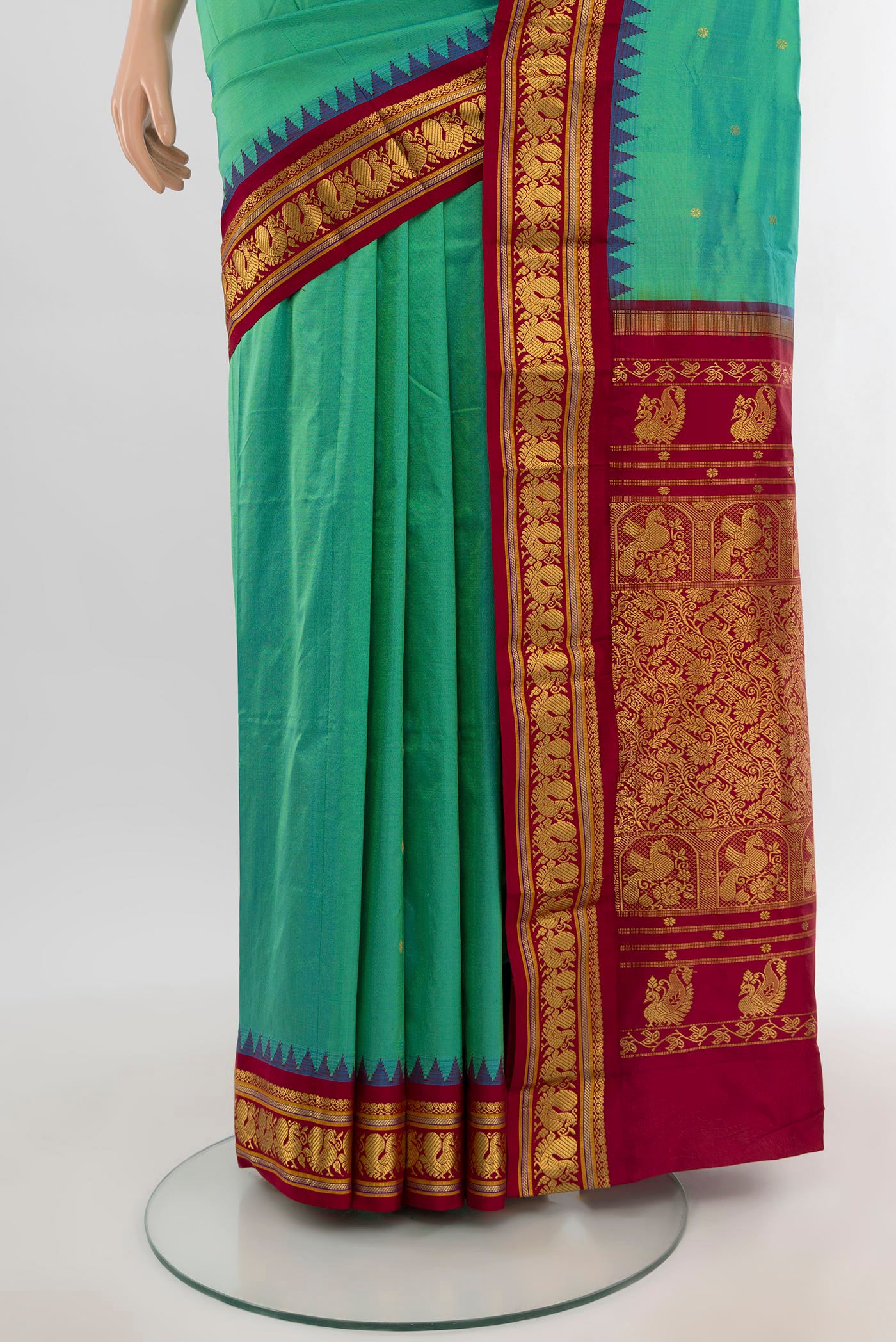 Pleats and pallu of Multi Color Bangalore Silk - kadyal Saree with Zari Butta on the body and Zari Border. 