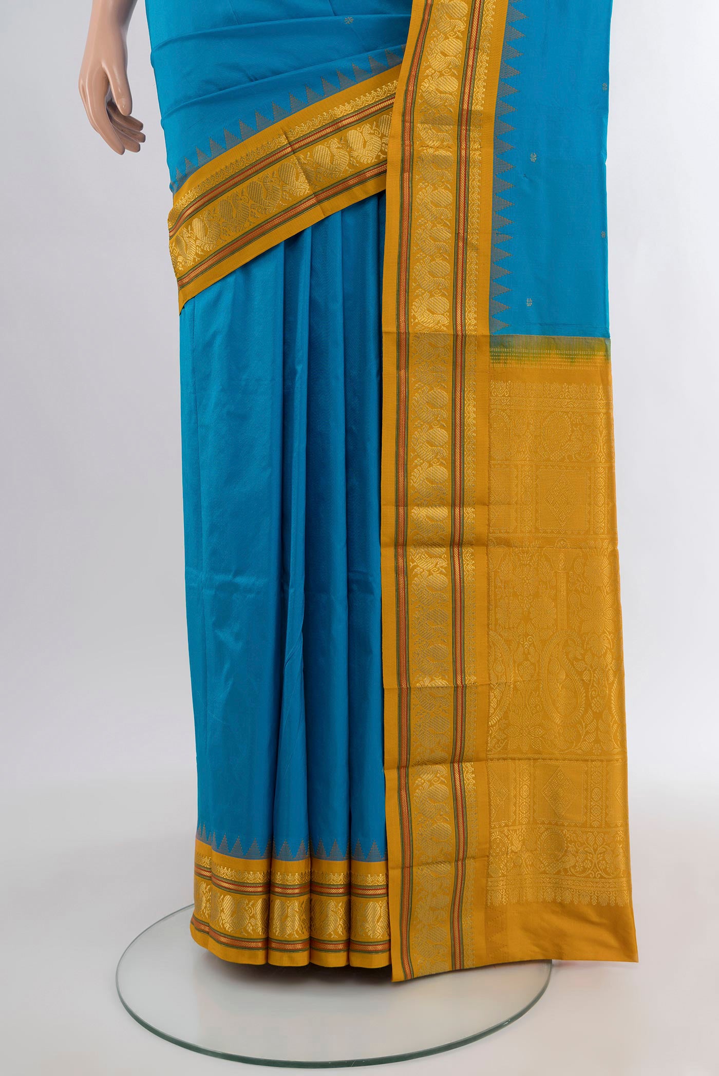 Pleats and pallu of Sky Blue Bangalore Silk - kadyal Saree with Zari Butta on the body and Zari Border. 