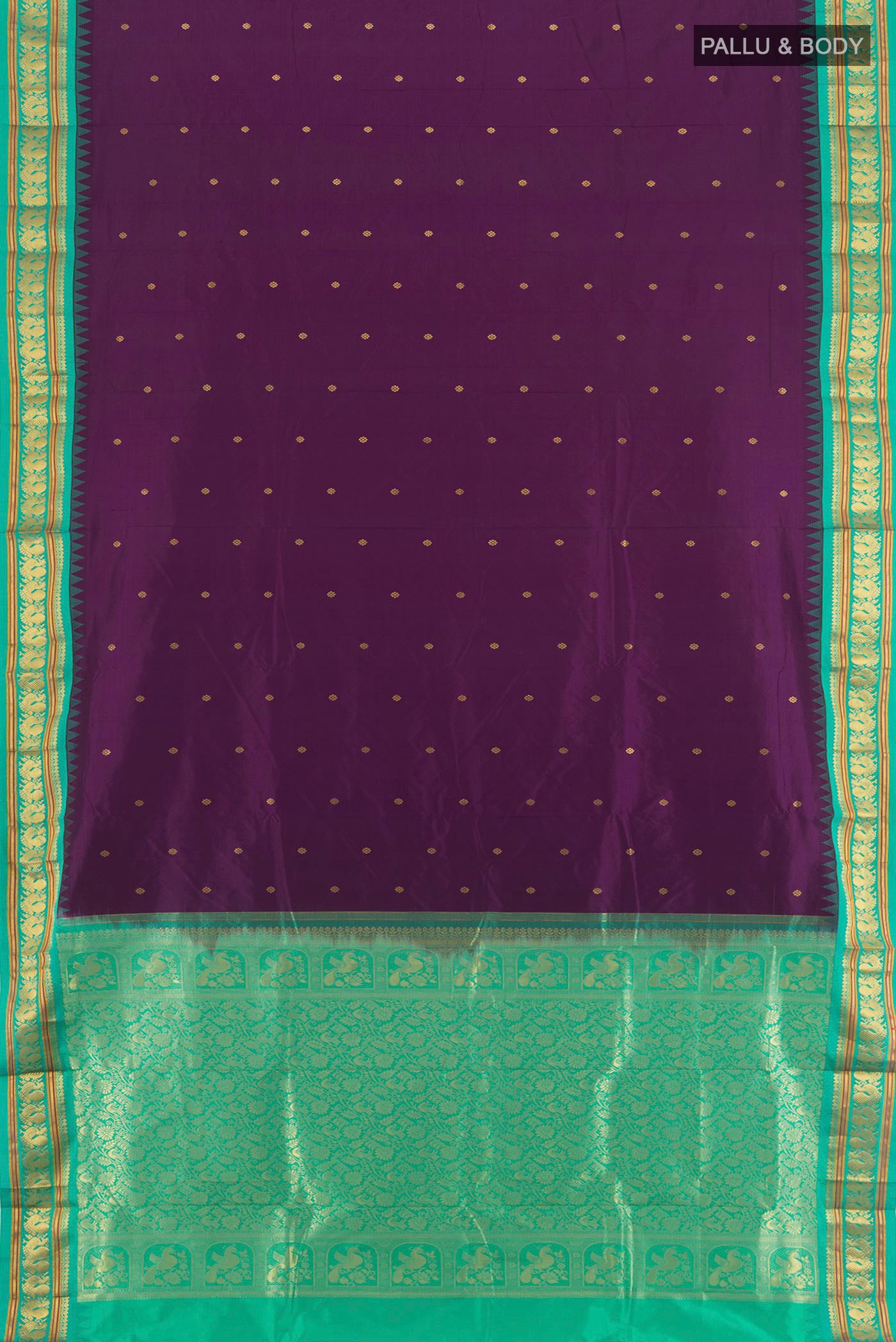 Flat view of Purple Bangalore Silk - kadyal Saree with Zari Butta on the body and Zari Border. 