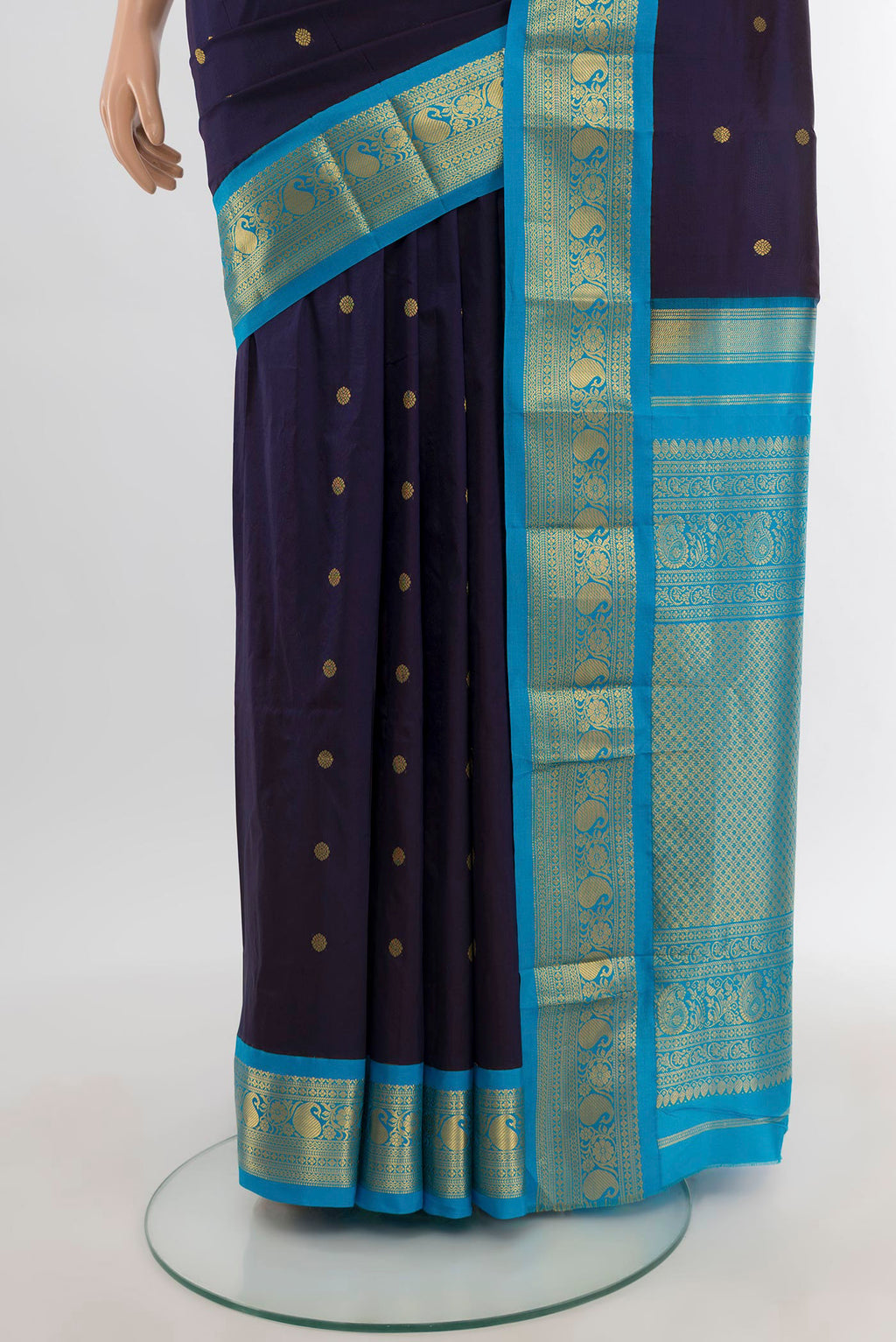 Pleats and pallu of Navy Blue Bangalore Silk - kadyal Saree with Zari Butta on the body and Zari Border. 