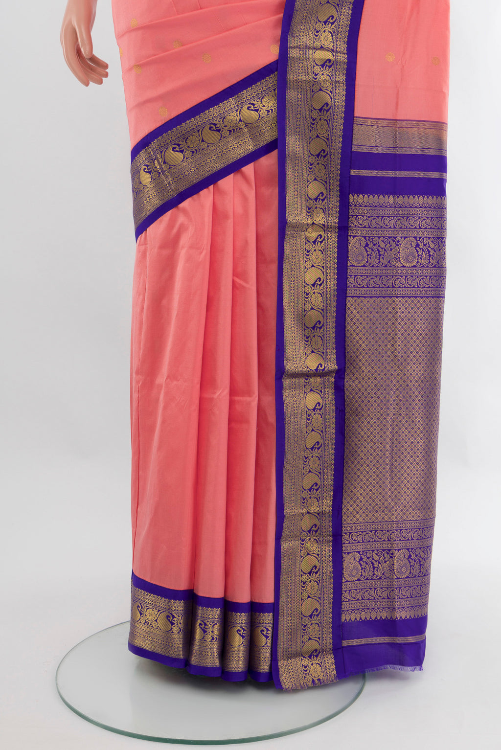 Pleats and pallu of Coral Bangalore Silk - kadyal Saree with Zari Butta on the body and Zari Border. 