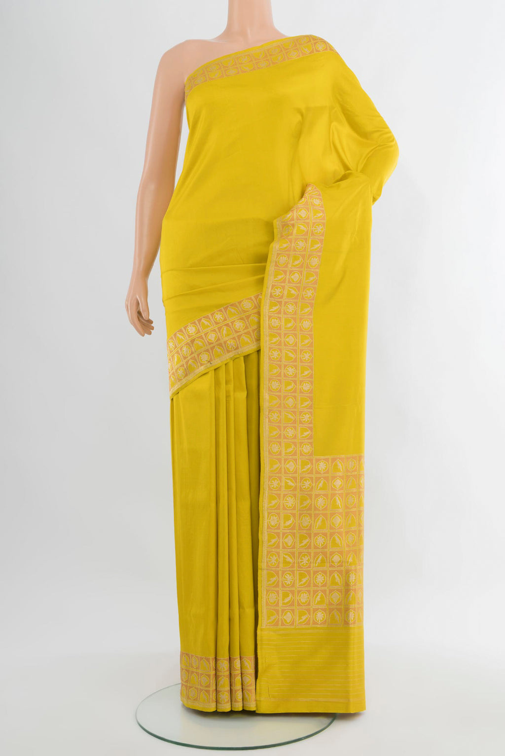 Lemon Yellow Banarasi Silk Saree with Plain Body and Zari Border.  displayed on a mannequin