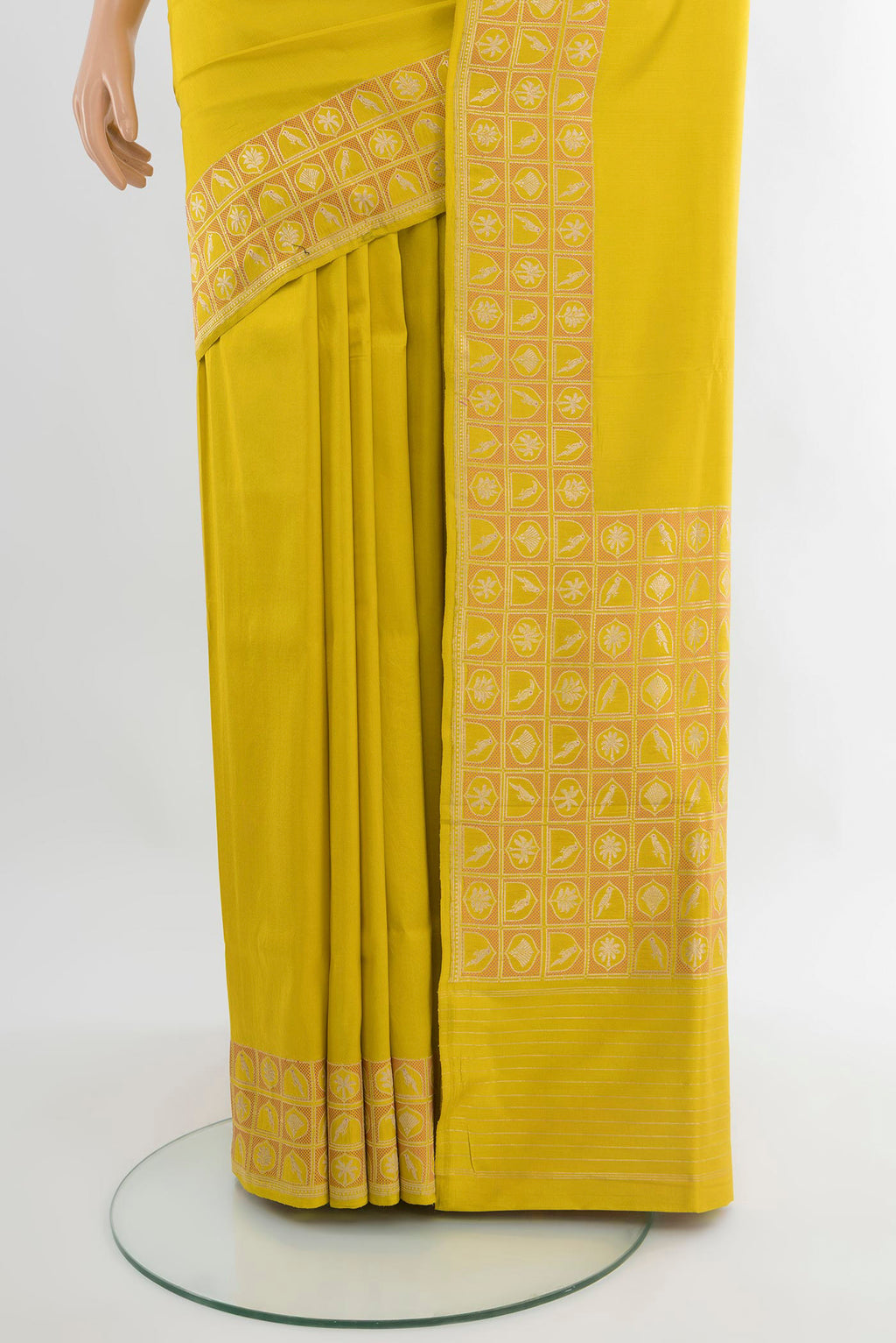 Pleats and pallu of Lemon Yellow Banarasi Silk Saree with Plain Body and Zari Border. 