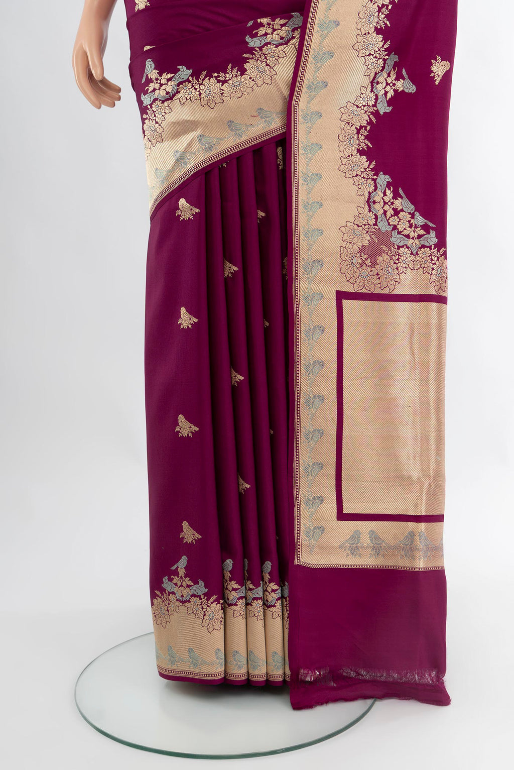 Pleats and pallu of Magenta Banarasi Silk Saree with Zari Butta on the body and Fancy Border. 