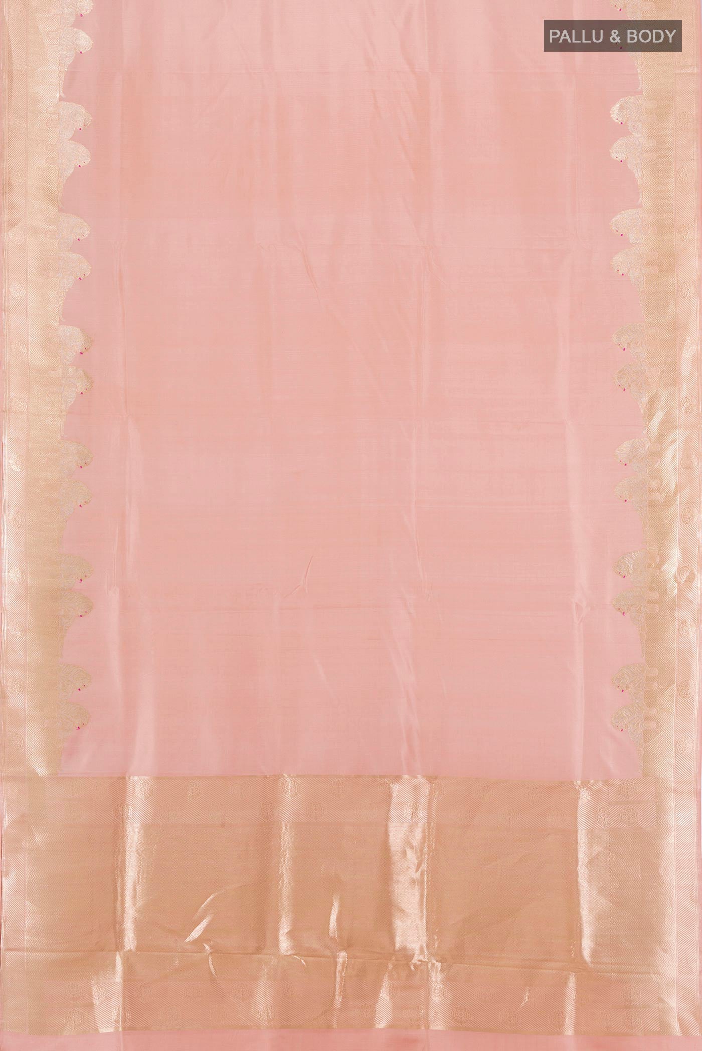 Flat view of Rose Gold Banarasi Katan Silk Saree with Plain Body and Zari Border. 