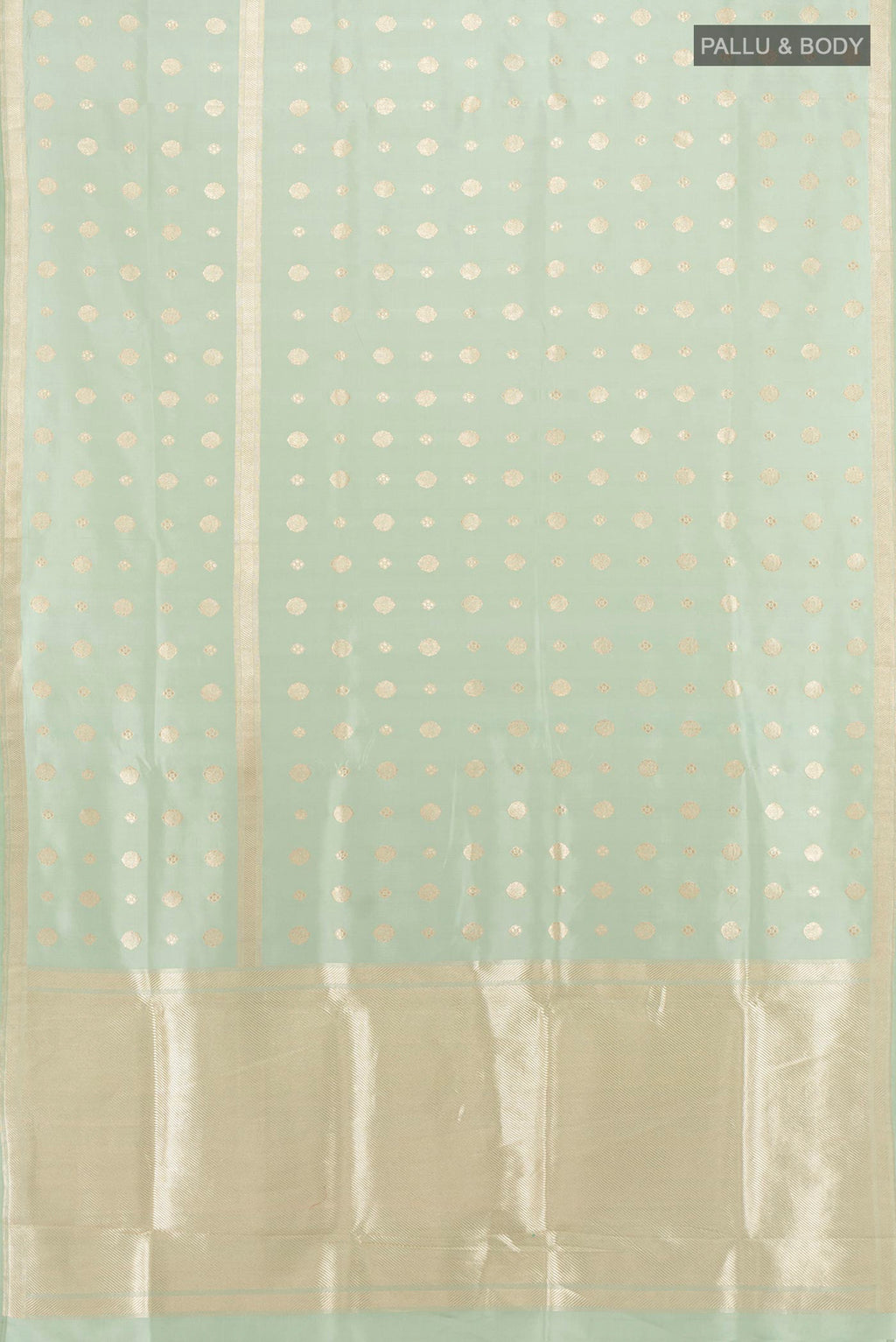 Flat view of Pure Silk Pista Green Banarasi Saree with Zari Butta on the body and Zari Border. 
