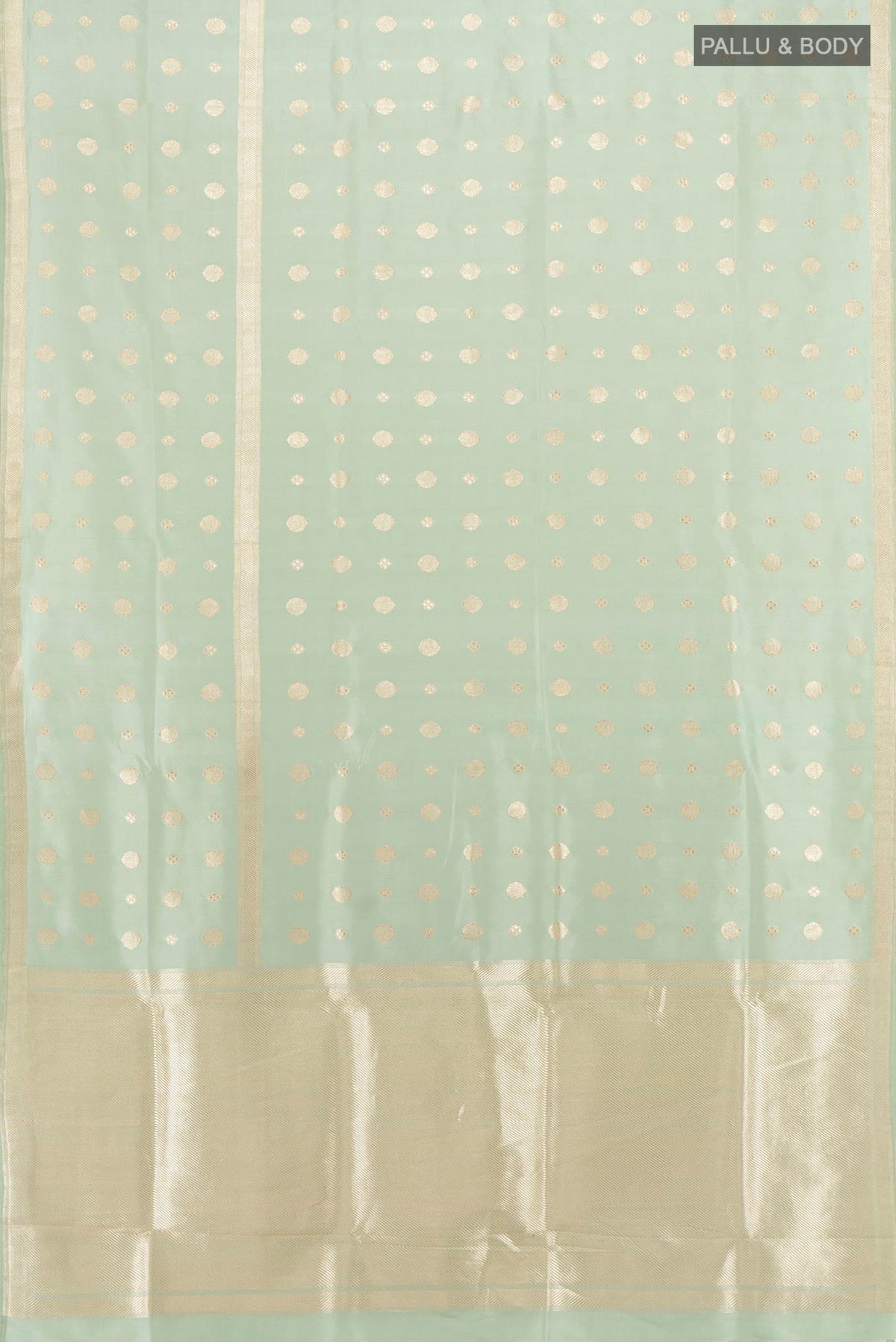 Flat view of Pure Silk Pista Green Banarasi Saree with Zari Butta on the body and Zari Border. 