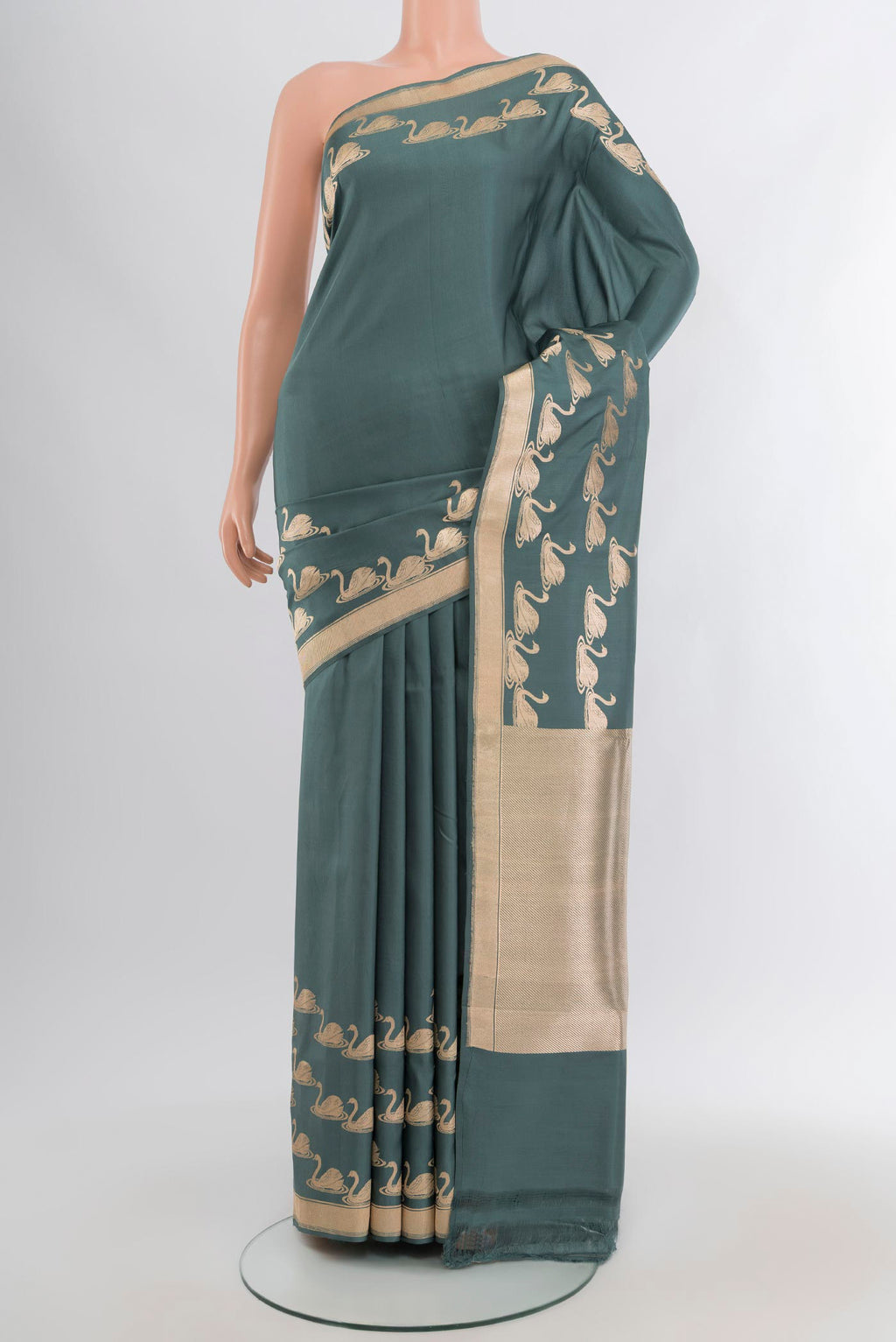 Grey Banarasi Silk Saree with Plain Body and Zari Border.  displayed on a mannequin