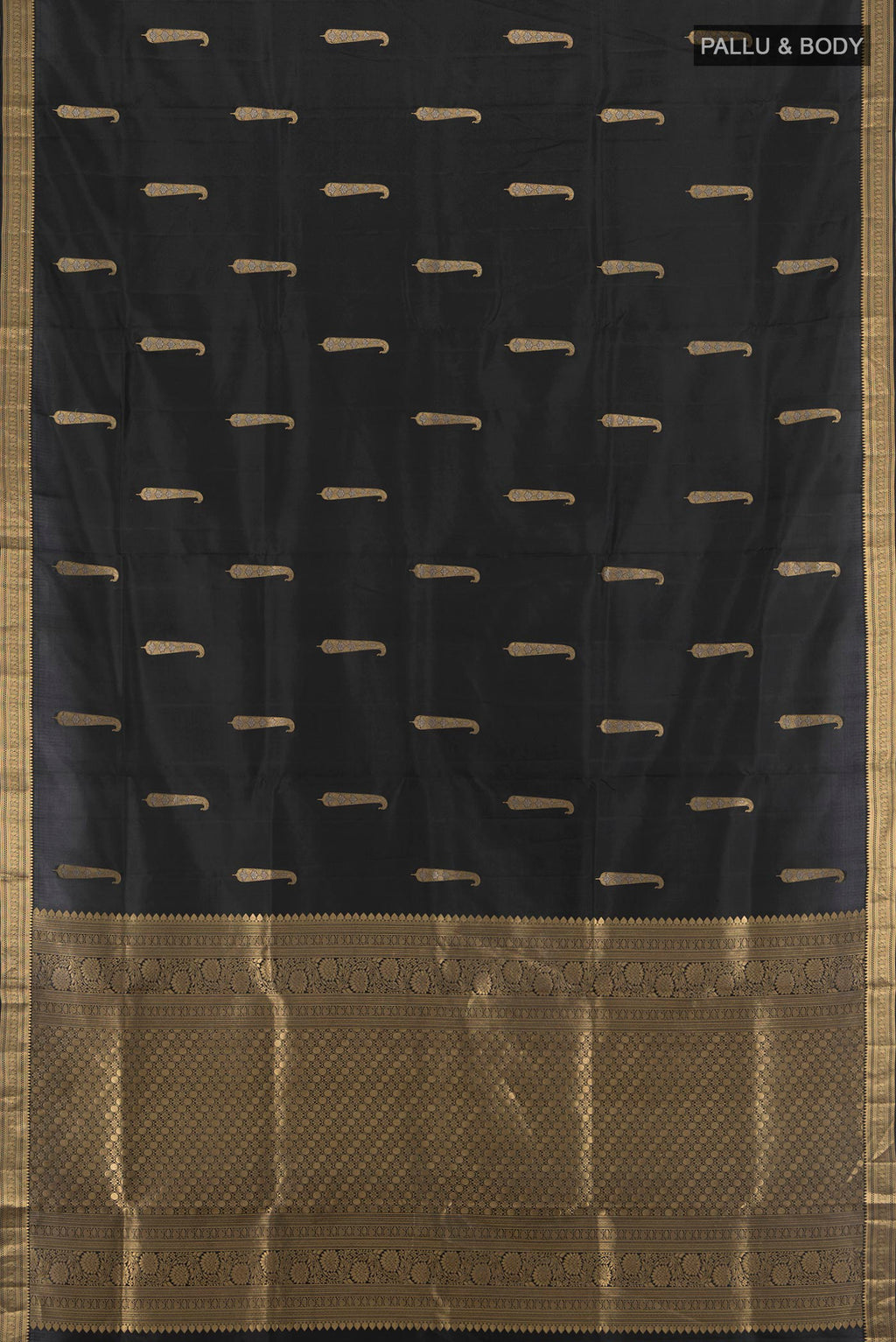 Flat view of Black Soft Silk Saree with Zari Butta on the body and Zari Border. 
