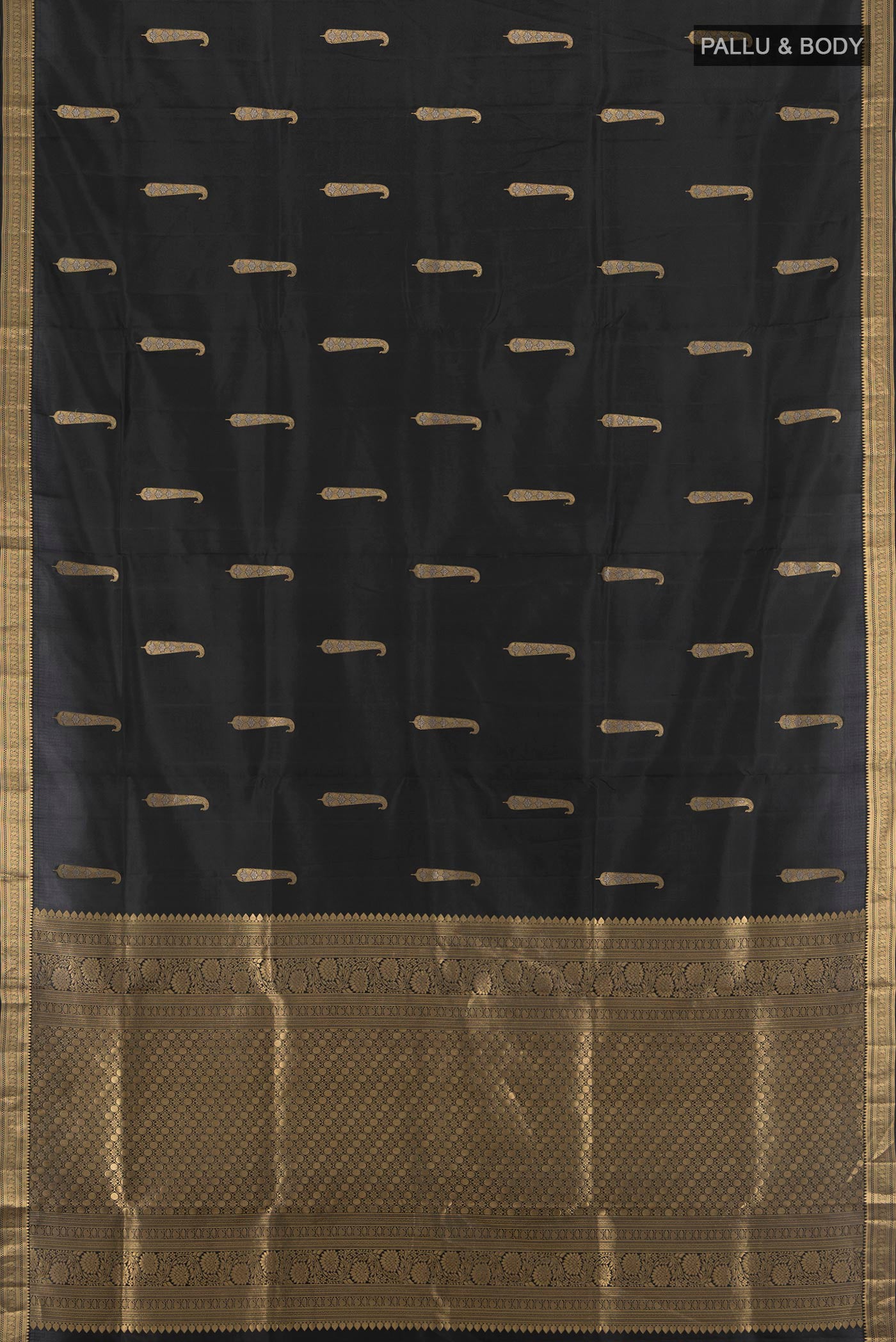 Flat view of Black Soft Silk Saree with Zari Butta on the body and Zari Border. 