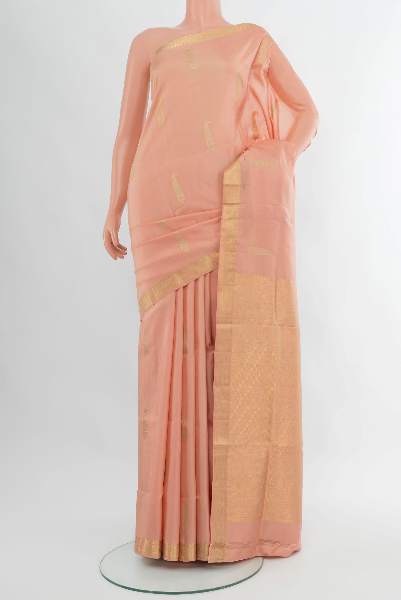 Peach Soft Silk Nine Yards Saree with Zari Butta on the body and Zari Border.  displayed on a mannequin