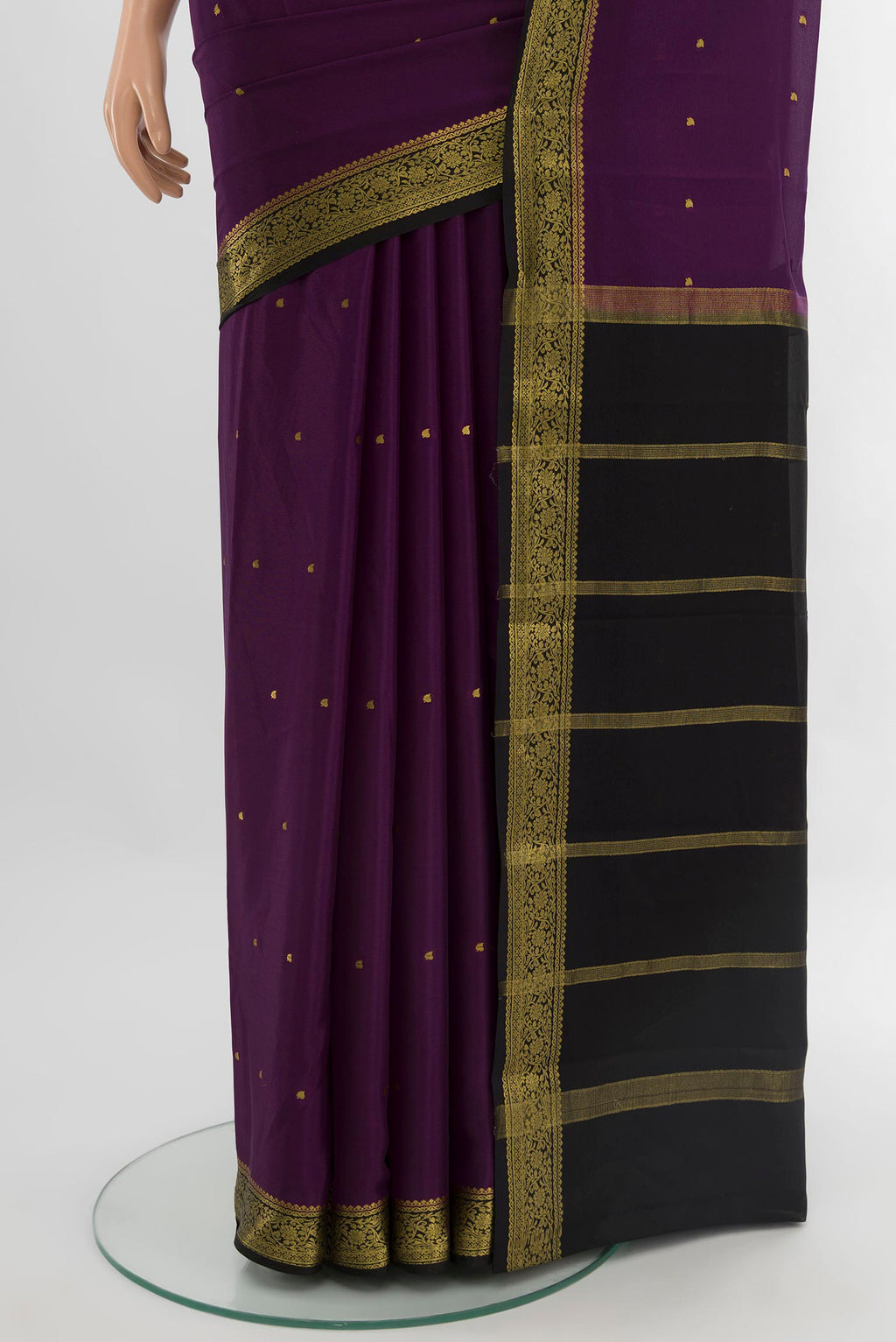 Pleats and pallu of Purple Mysore Crepe Saree with Zari Butta on the body and Zari Border. 