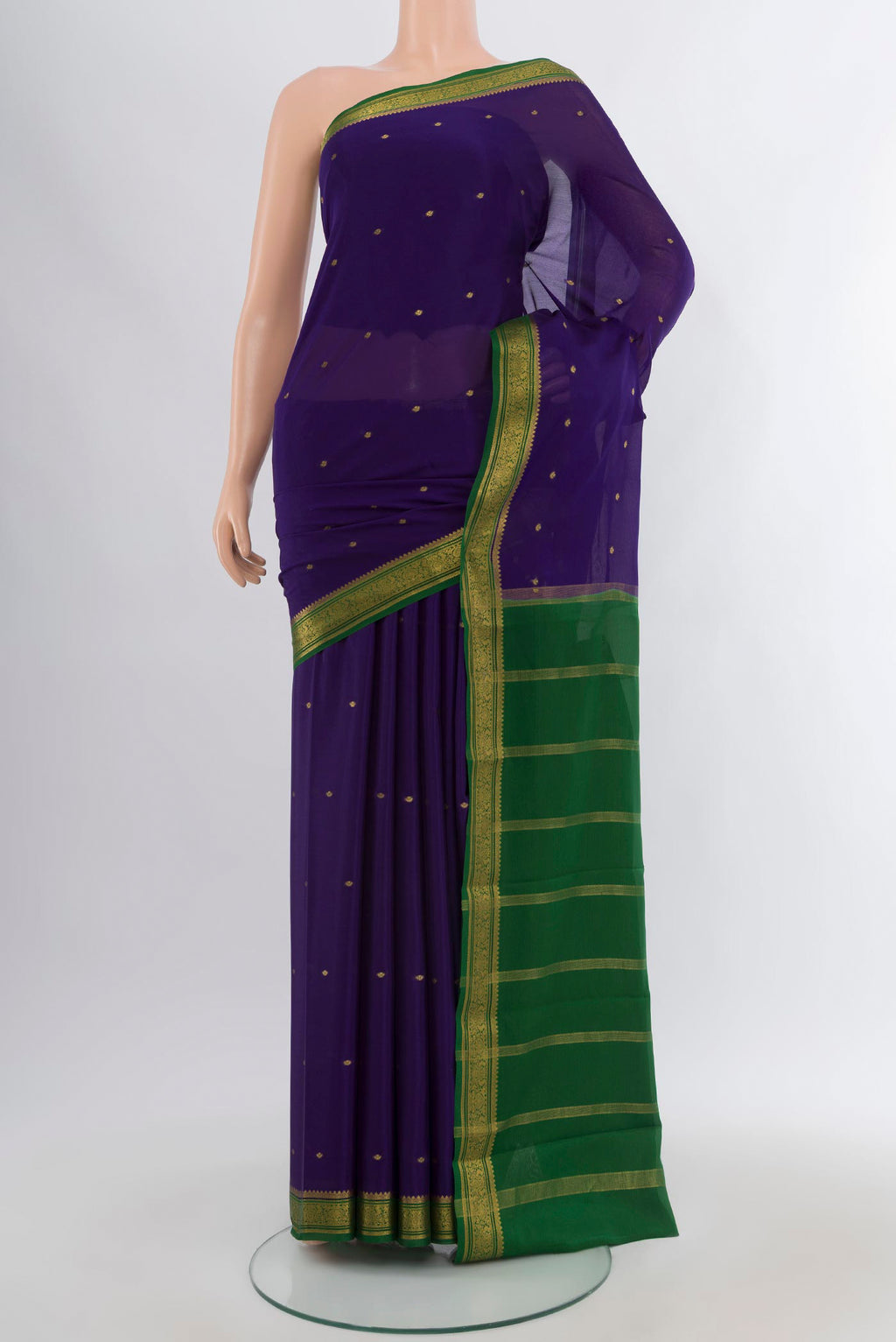 Dark Blue Mysore Crepe Saree with Zari Butta on the body and Zari Border.  displayed on a mannequin