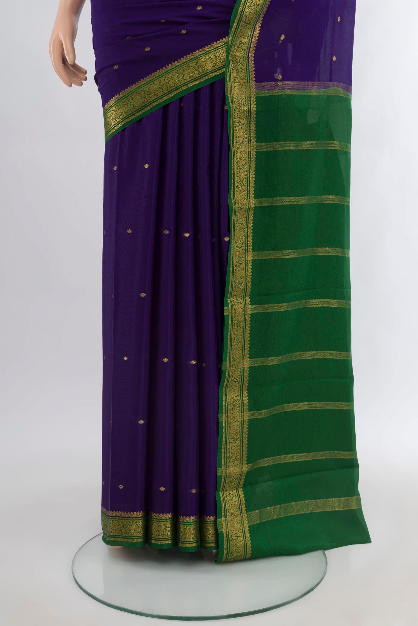 Pleats and pallu of Dark Blue Mysore Crepe Saree with Zari Butta on the body and Zari Border. 