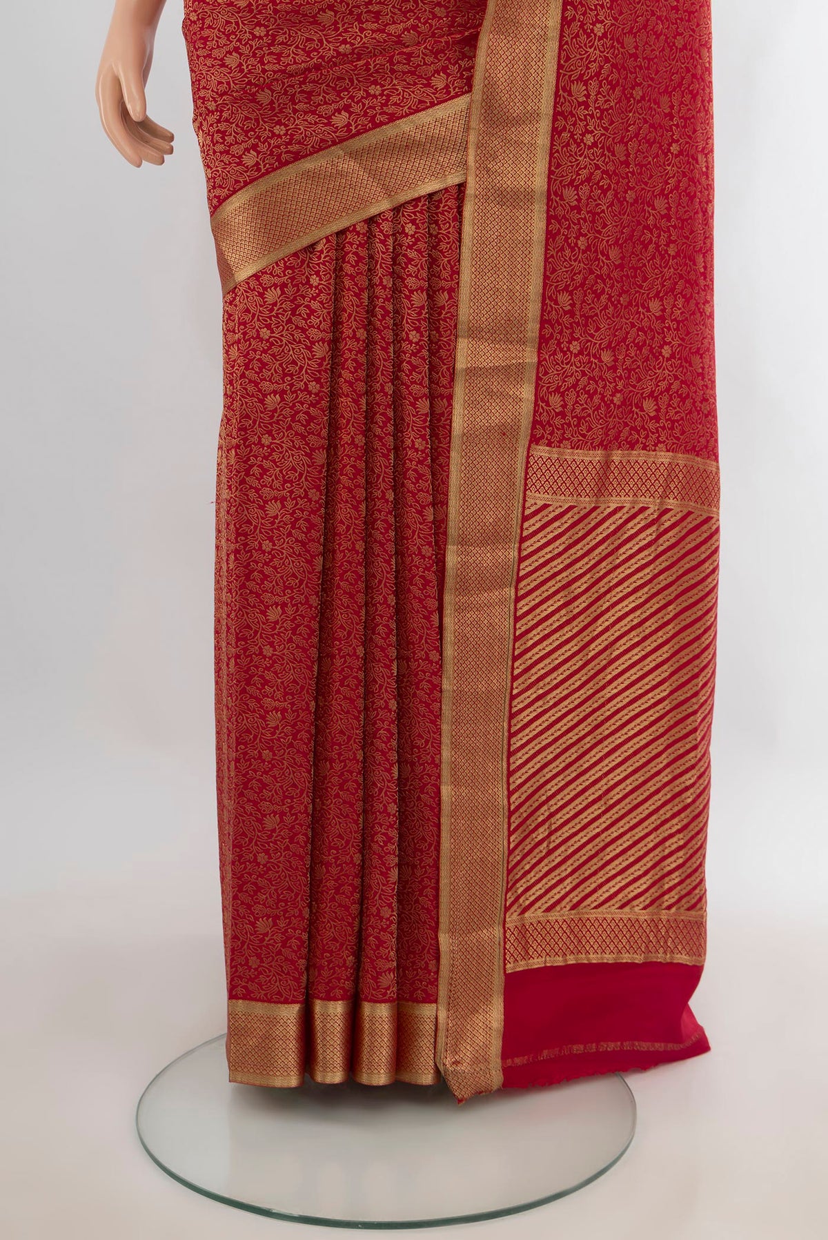 Pleats and pallu of Red Mysore Crepe Saree with Zari Brocade on the body and Zari Border. 