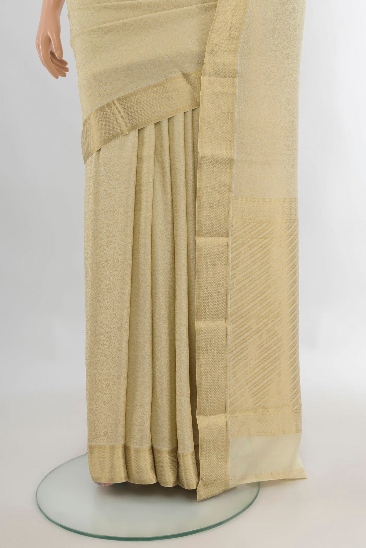 Pleats and pallu of Cream Mysore Crepe Saree with Zari Brocade on the body and Zari Border. 