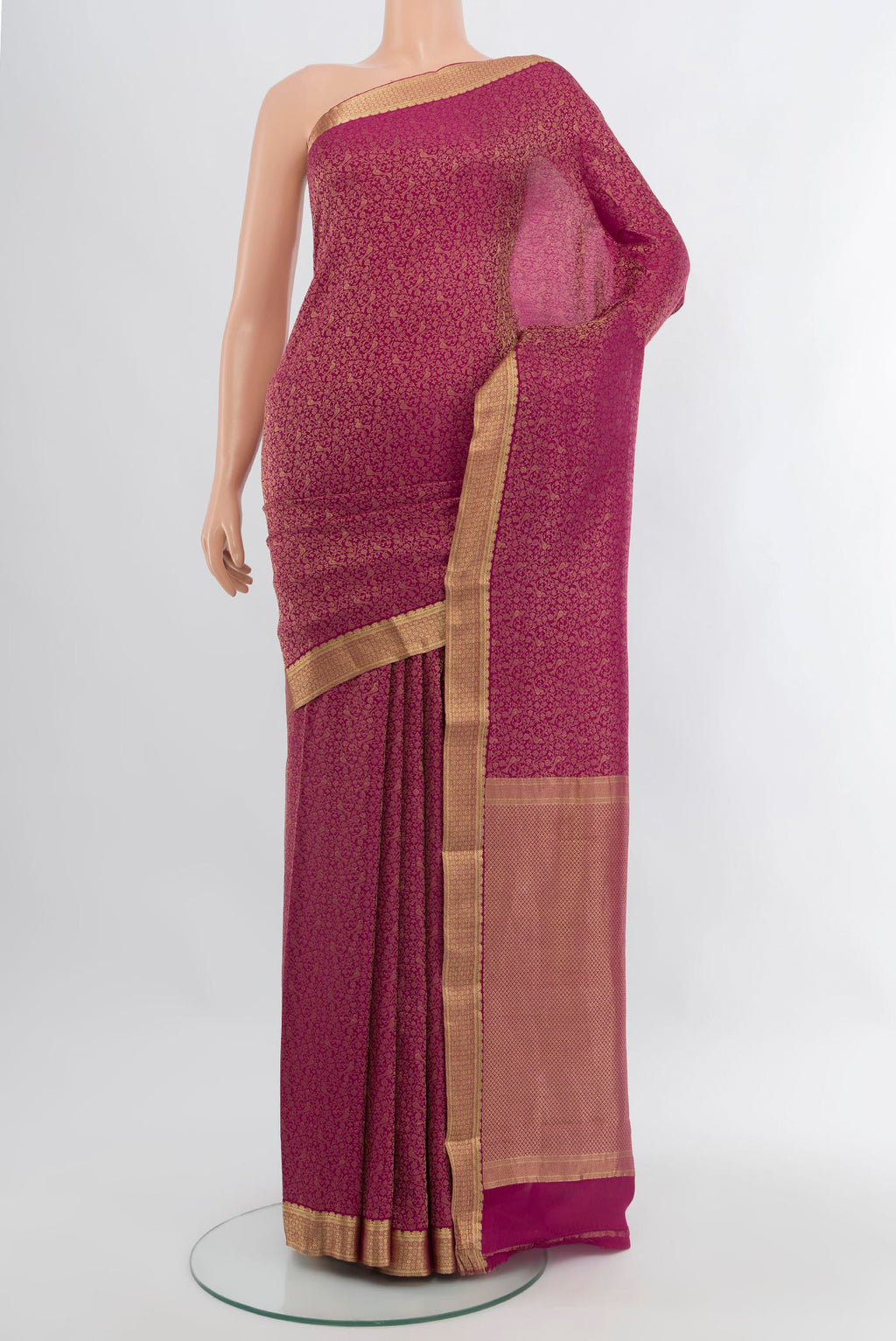Magenta Mysore Crepe Saree with Zari Brocade on the body and Zari Border.  displayed on a mannequin