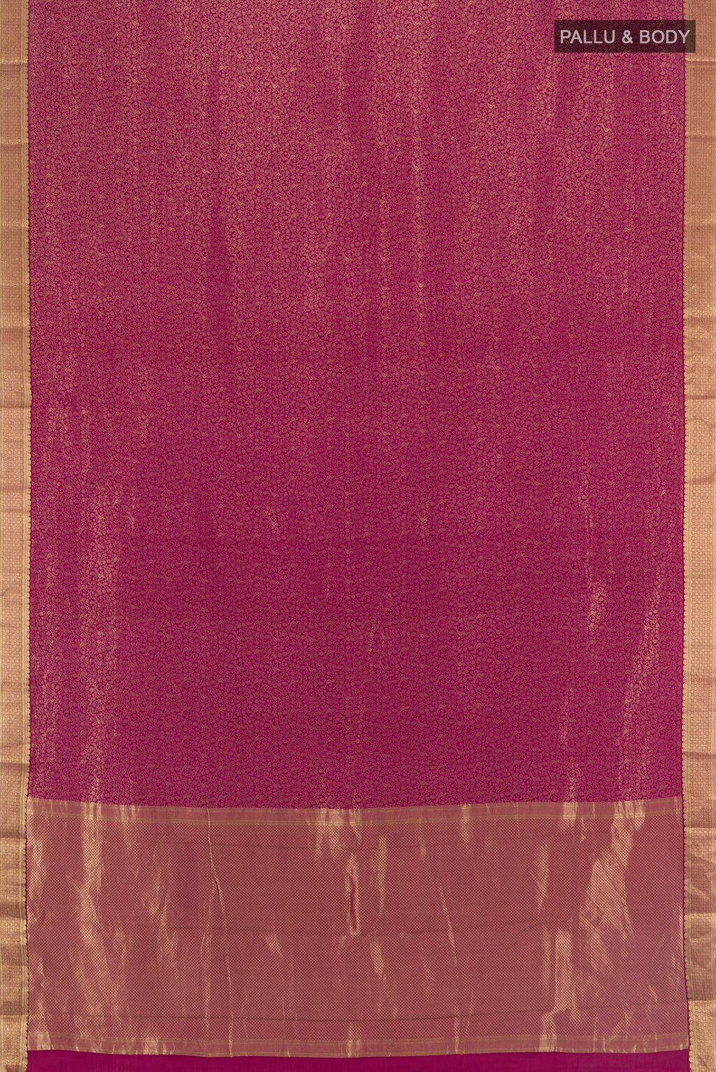 Flat view of Magenta Mysore Crepe Saree with Zari Brocade on the body and Zari Border. 