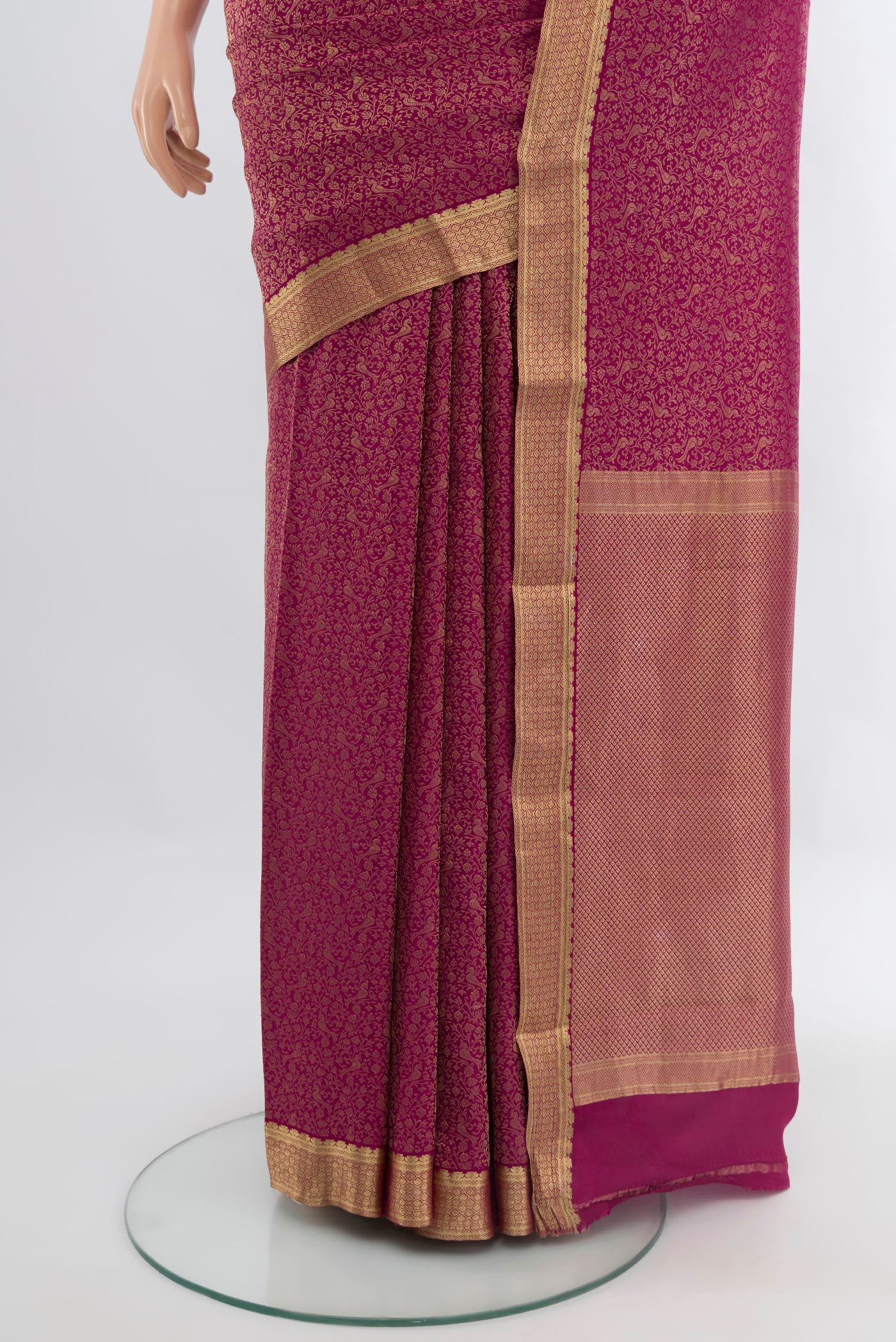 Pleats and pallu of Magenta Mysore Crepe Saree with Zari Brocade on the body and Zari Border. 