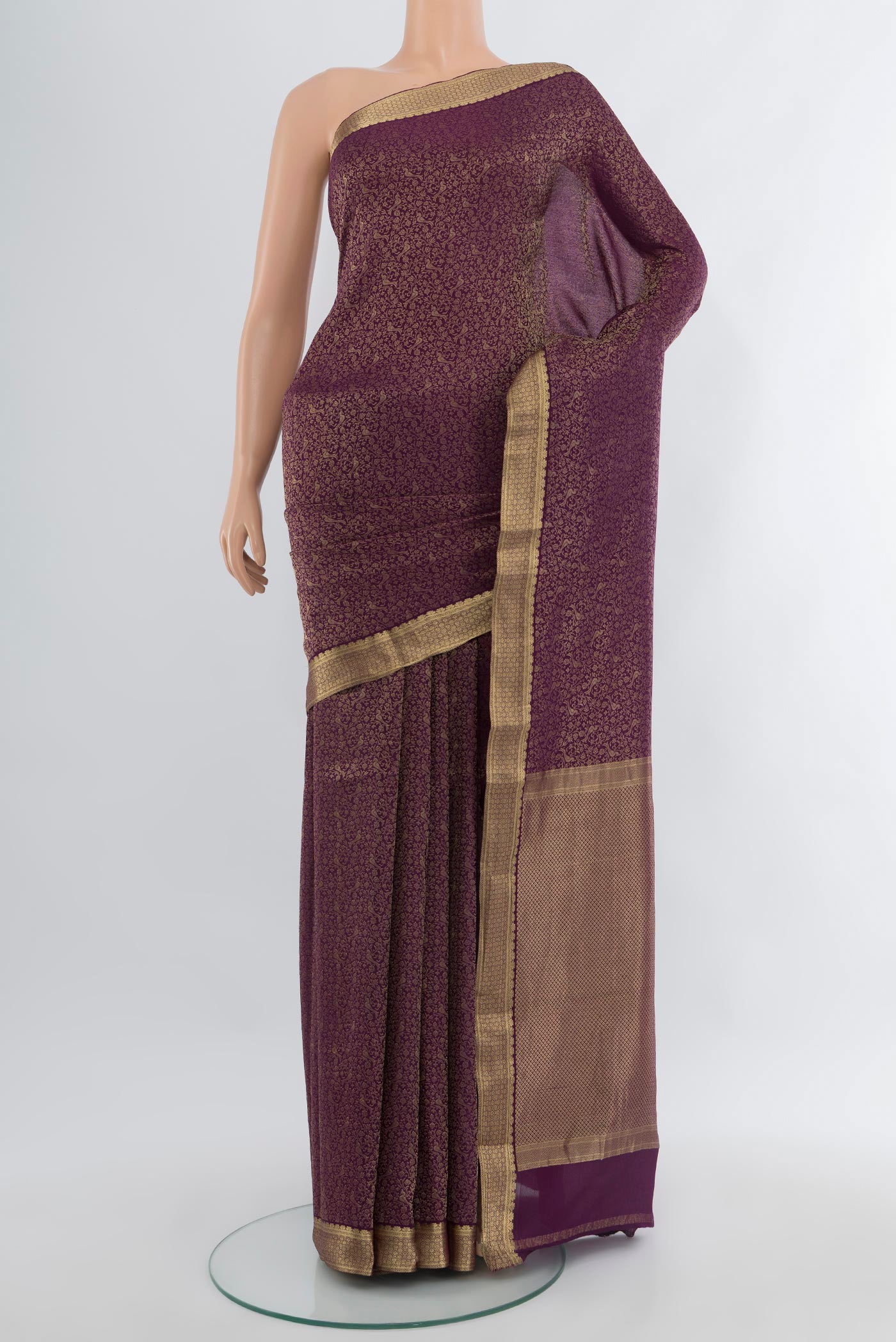 Violet Mysore Crepe Saree with Zari Brocade on the body and Zari Border.  displayed on a mannequin