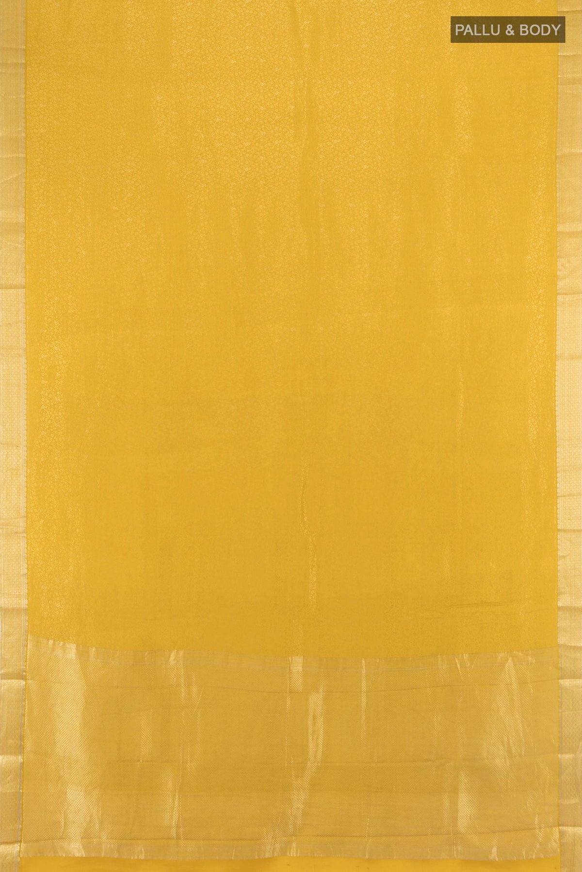 Flat view of Yellow Mysore Crepe Saree with Zari Brocade on the body and Zari Border. 