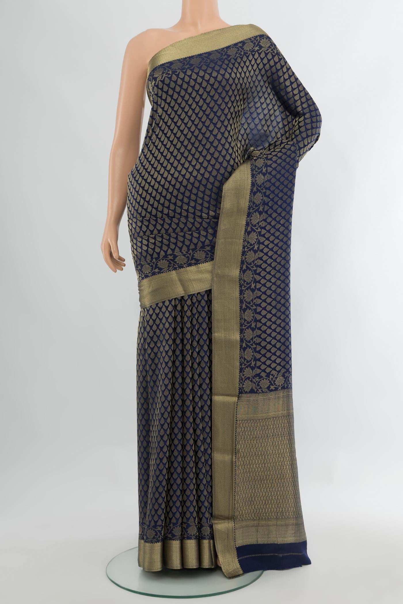 Navy Blue Mysore Crepe Saree with Zari Brocade on the body and Zari Border.  displayed on a mannequin