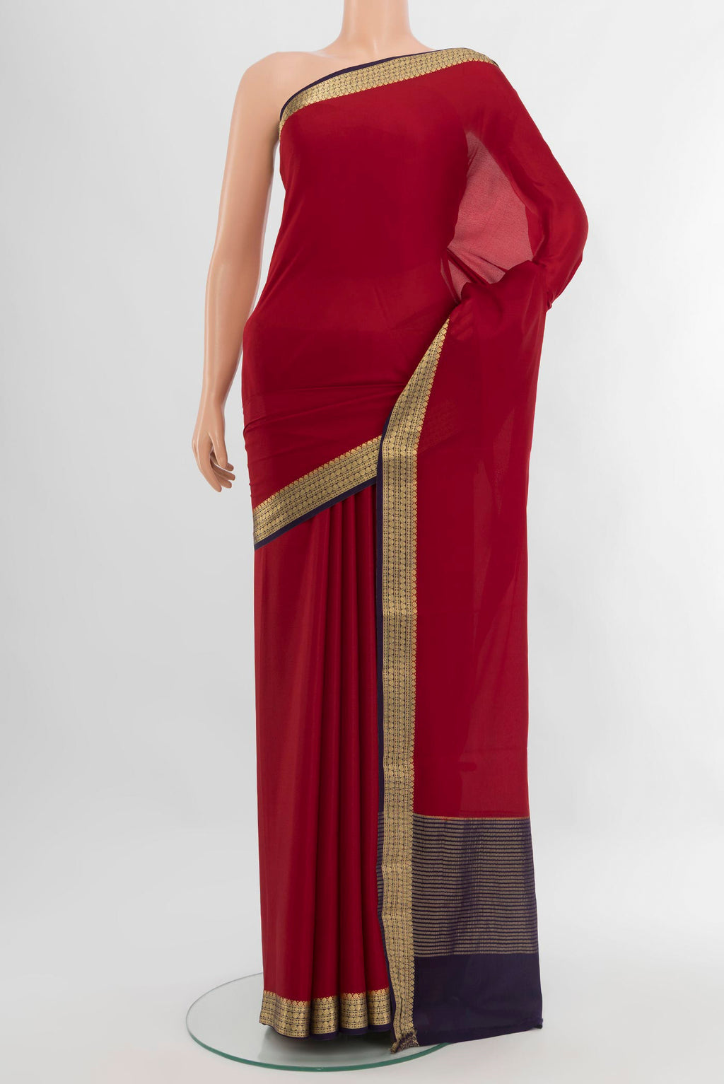 Red Mysore Crepe Saree with Plain Body and Zari Border.  displayed on a mannequin