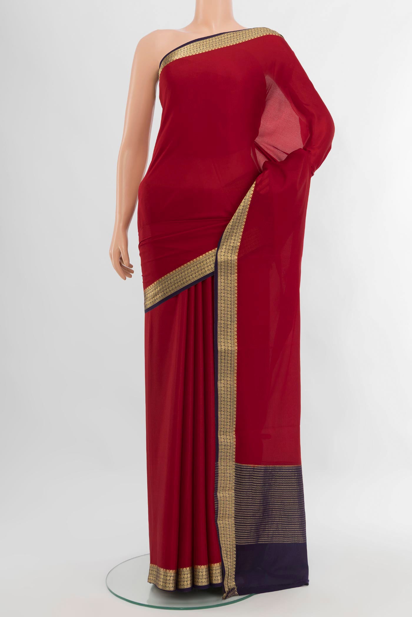Red Mysore Crepe Saree with Plain Body and Zari Border.  displayed on a mannequin
