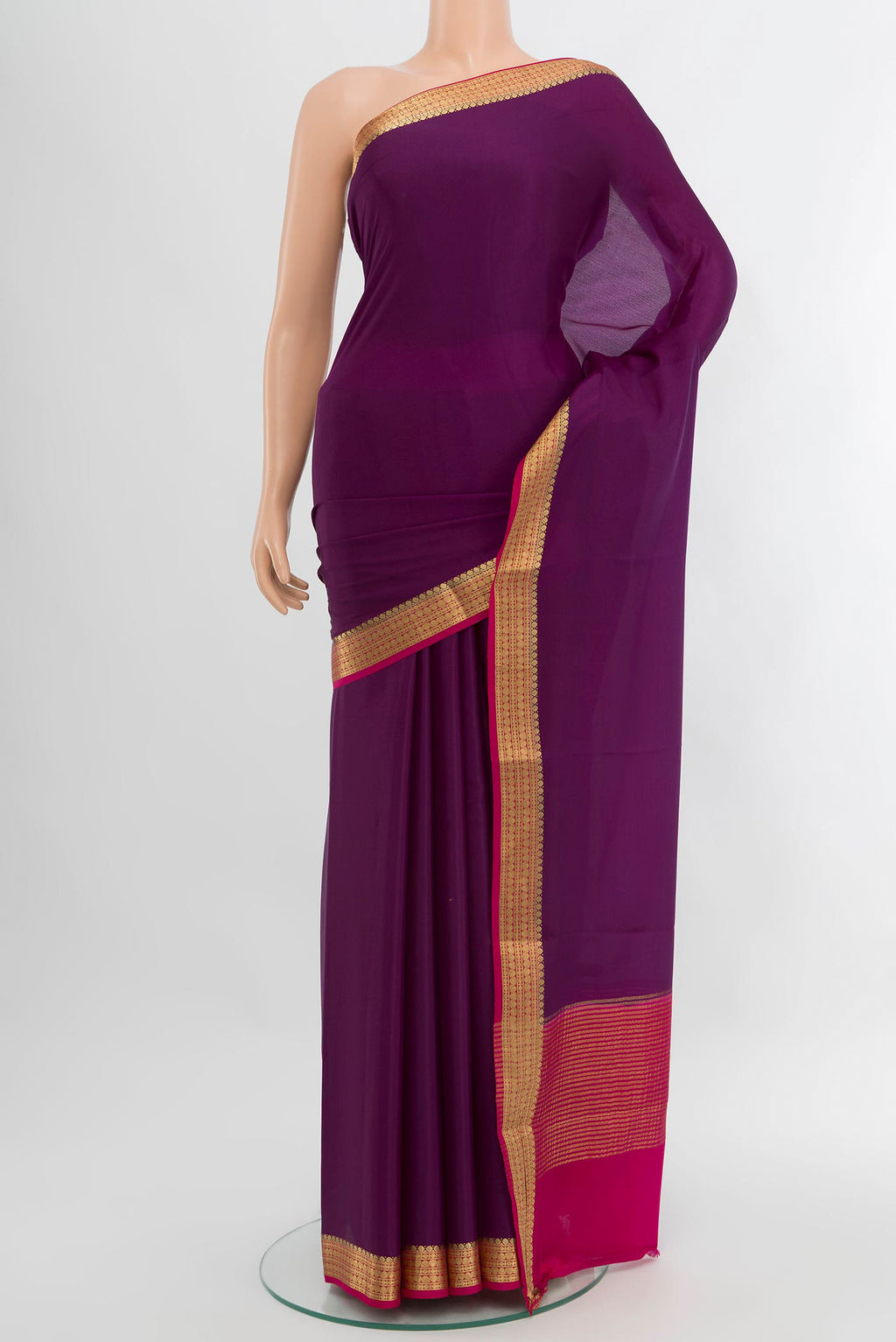 Violet Mysore Crepe Saree with Plain Body and Zari Border.  displayed on a mannequin
