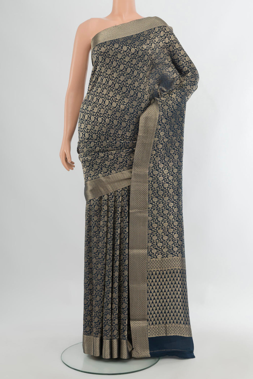 Navy Blue Mysore Crepe Saree with Zari Brocade on the body and Zari Border.  displayed on a mannequin