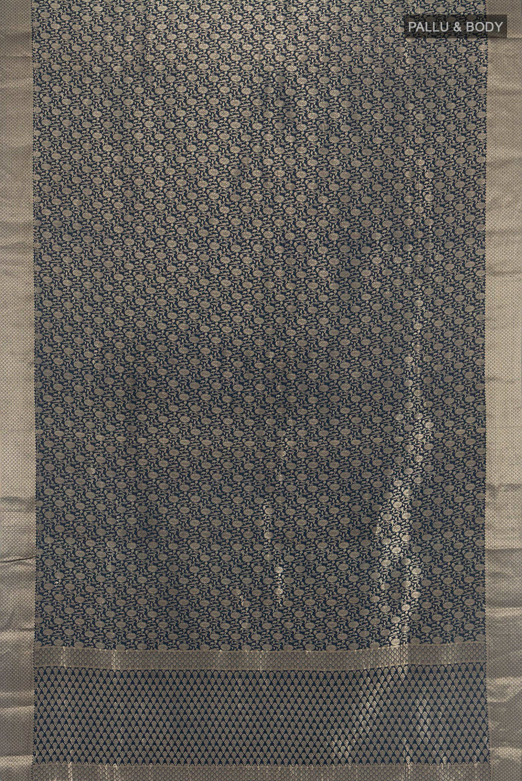 Flat view of Navy Blue Mysore Crepe Saree with Zari Brocade on the body and Zari Border. 