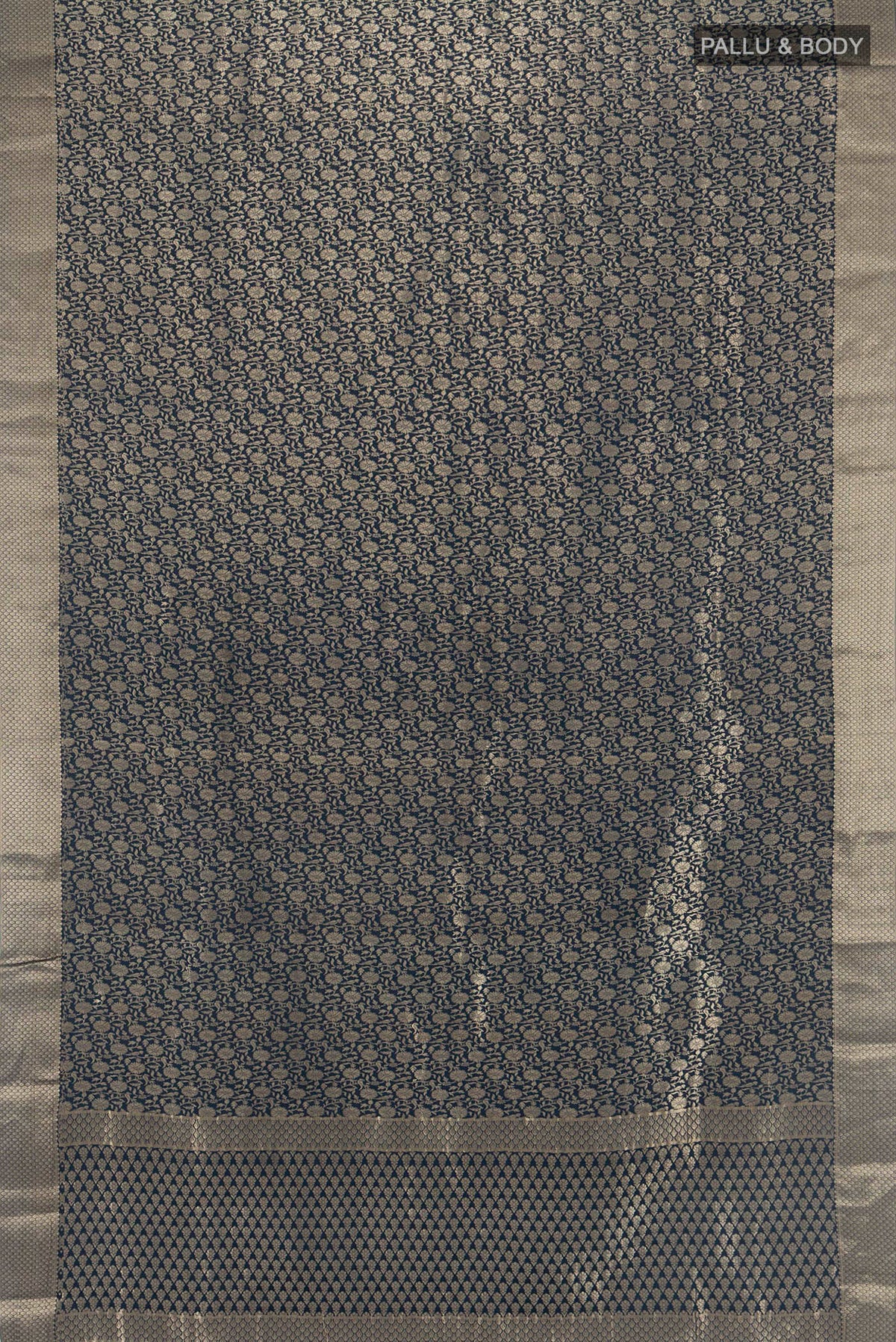 Flat view of Navy Blue Mysore Crepe Saree with Zari Brocade on the body and Zari Border. 