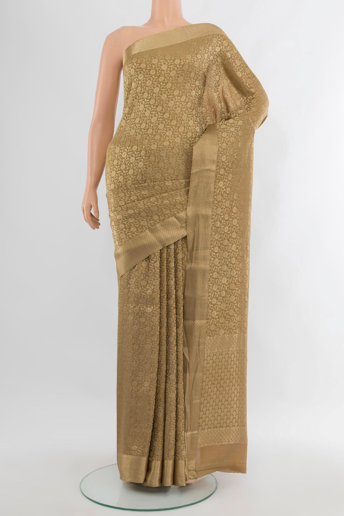 Dark Beige Mysore Crepe Saree with Zari Brocade on the body and Zari Border.  displayed on a mannequin