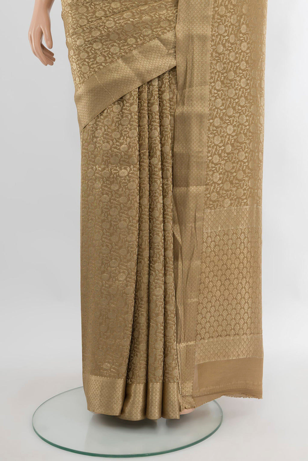 Pleats and pallu of Dark Beige Mysore Crepe Saree with Zari Brocade on the body and Zari Border. 