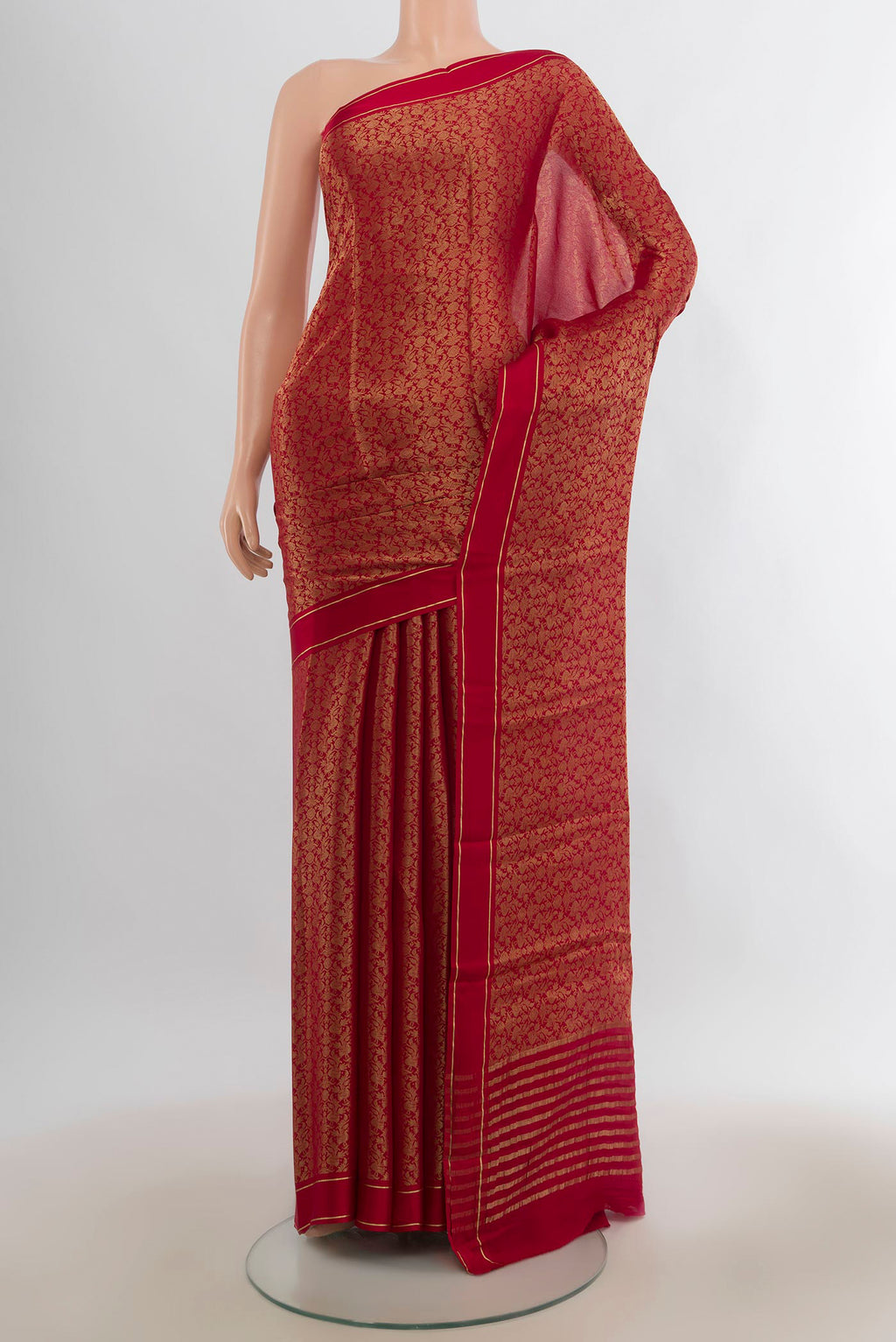 Red Mysore Georgette Saree with Zari Brocade on the body and Plain Border.  displayed on a mannequin