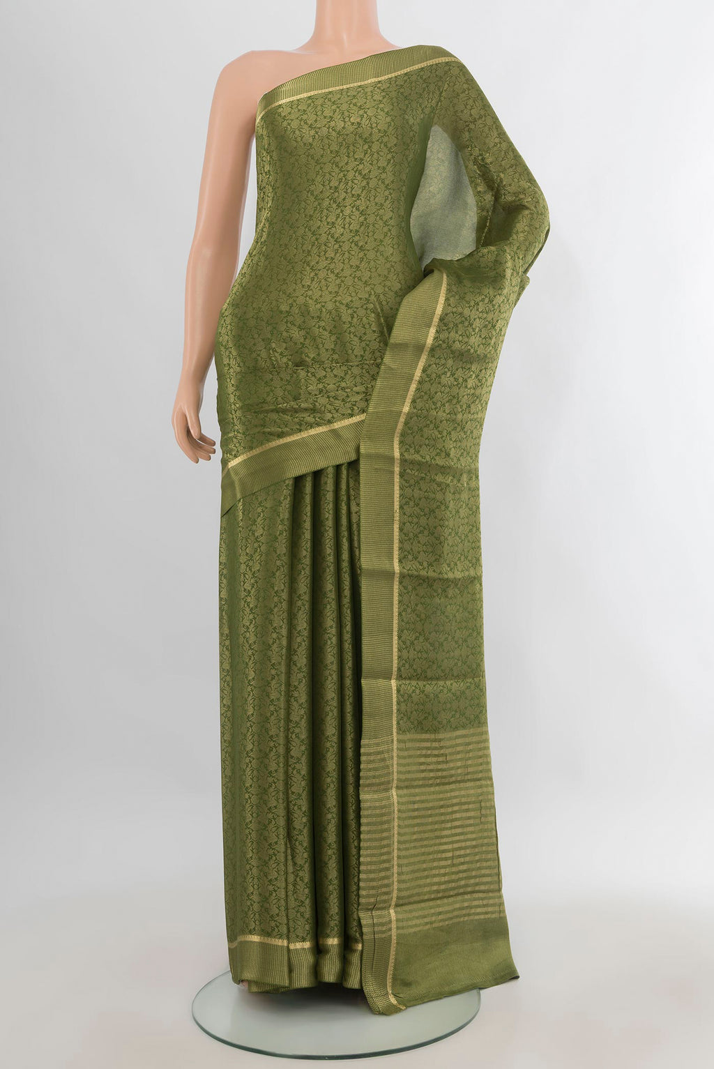 Mehandi Green Mysore Crepe Saree with Zari Brocade on the body and Zari Border.  displayed on a mannequin