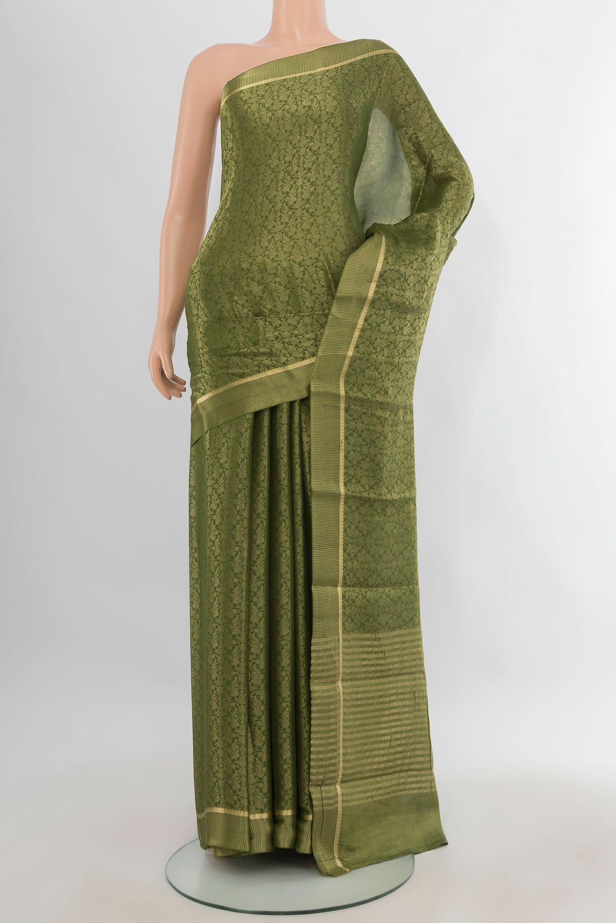 Mehandi Green Mysore Crepe Saree with Zari Brocade on the body and Zari Border.  displayed on a mannequin