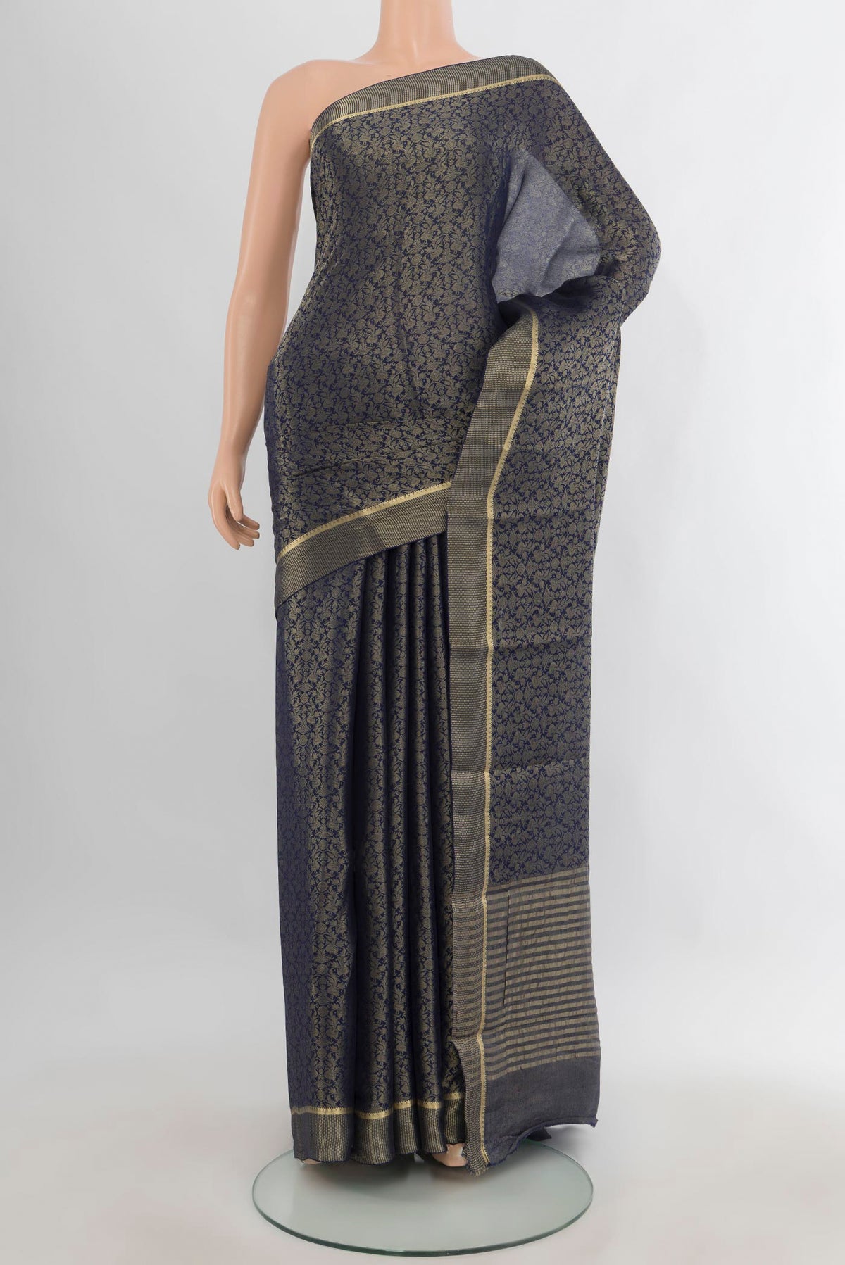 Navy Blue Mysore Crepe Saree with Zari Brocade on the body and Plain Border.  displayed on a mannequin