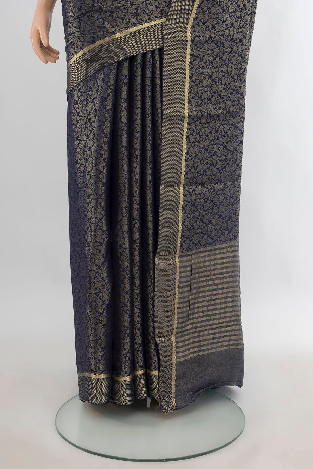 Pleats and pallu of Navy Blue Mysore Crepe Saree with Zari Brocade on the body and Plain Border. 
