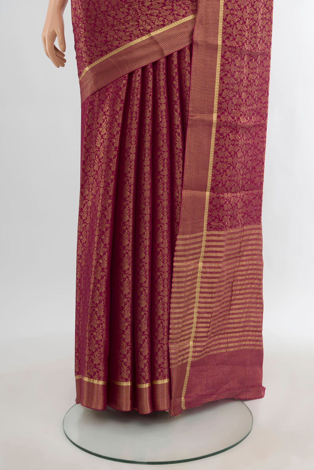 Pleats and pallu of Magenta Mysore Crepe Saree with Zari Brocade on the body and Zari Border. 