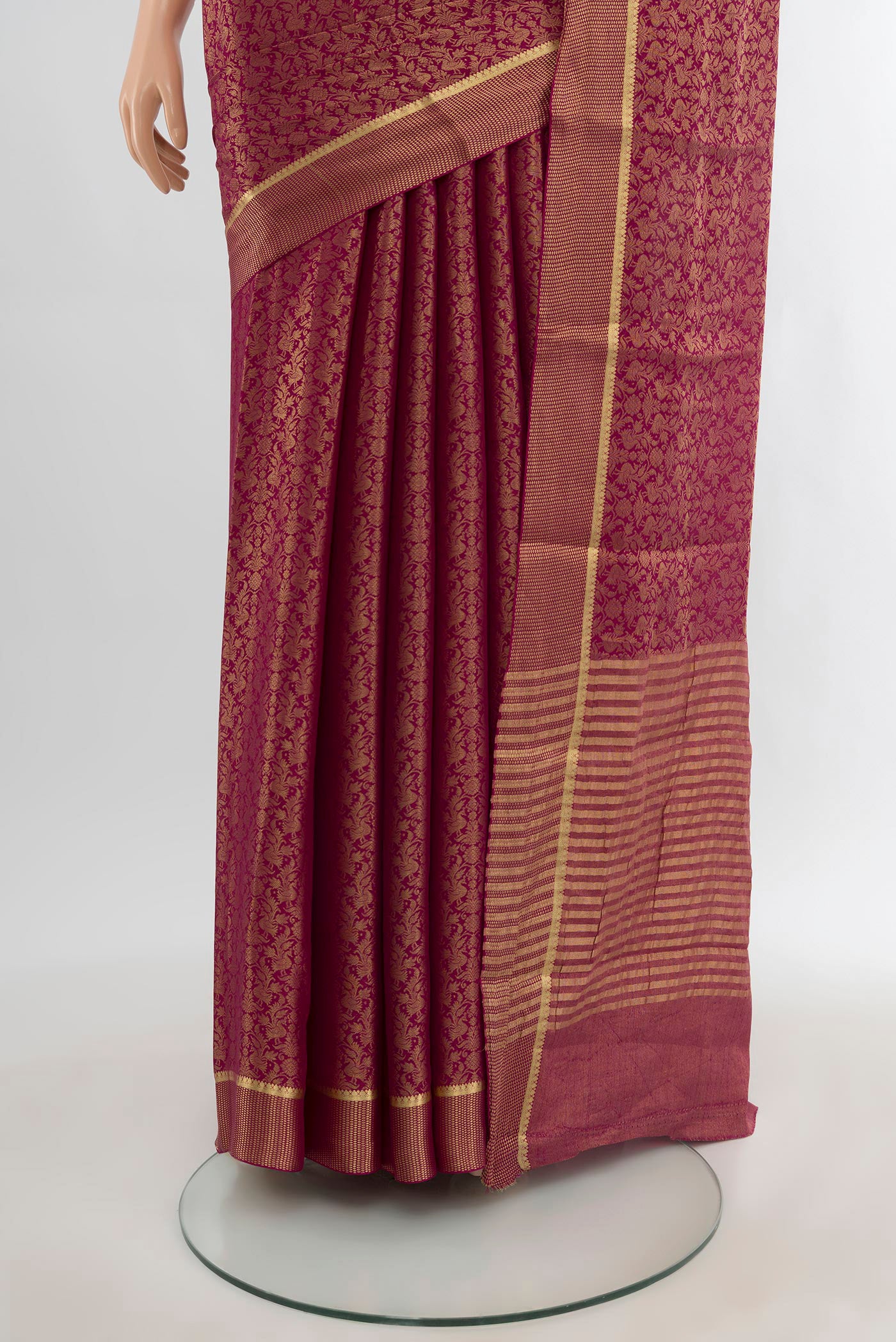 Pleats and pallu of Magenta Mysore Crepe Saree with Zari Brocade on the body and Zari Border. 