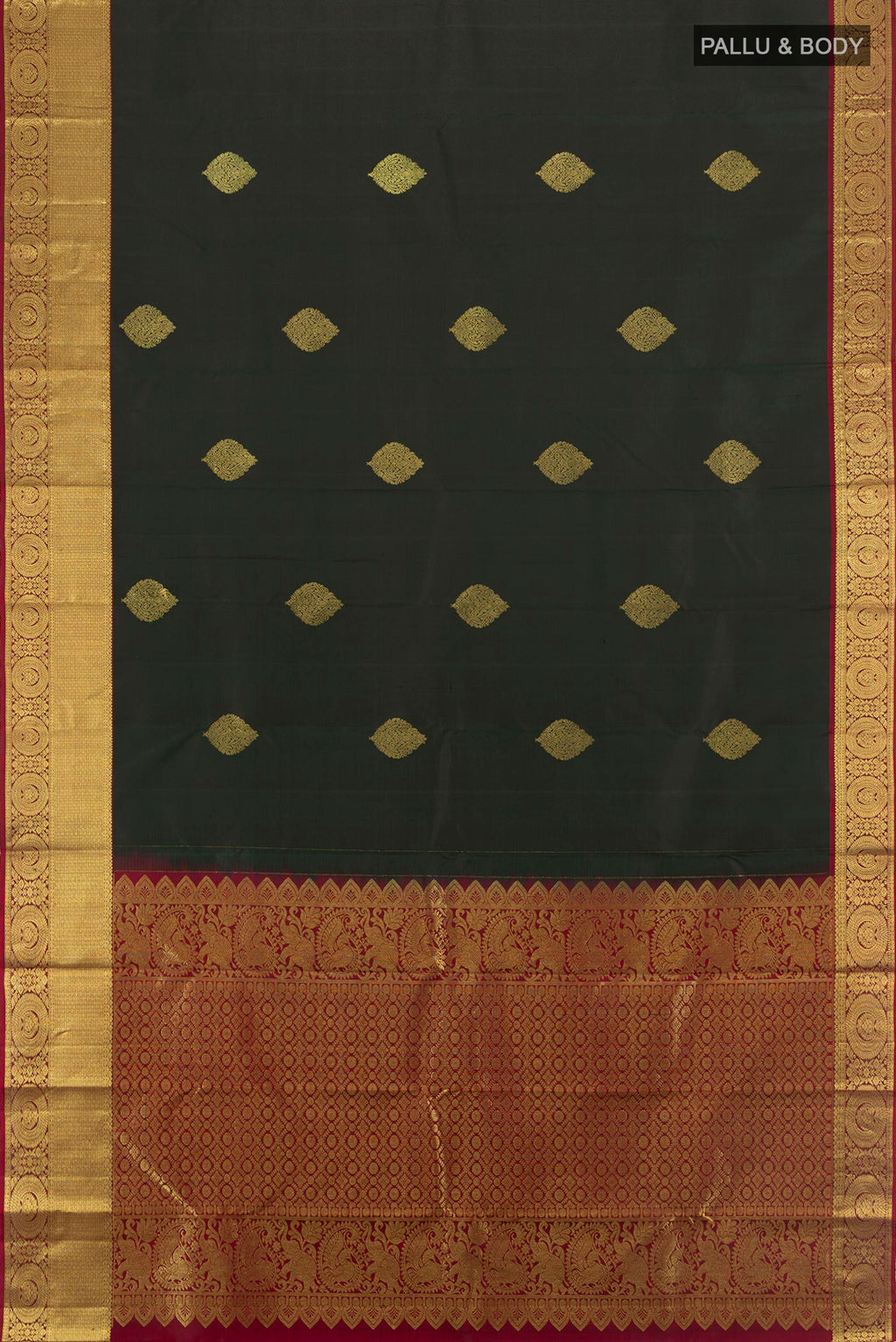 Flat view of Bottle Green Kanchipuram Silk Saree with Zari Butta on the body and Zari Border. 