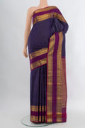 Navy Blue Kanjivaram Silk Saree with Checked design on the body and Zari Border.  displayed on a mannequin